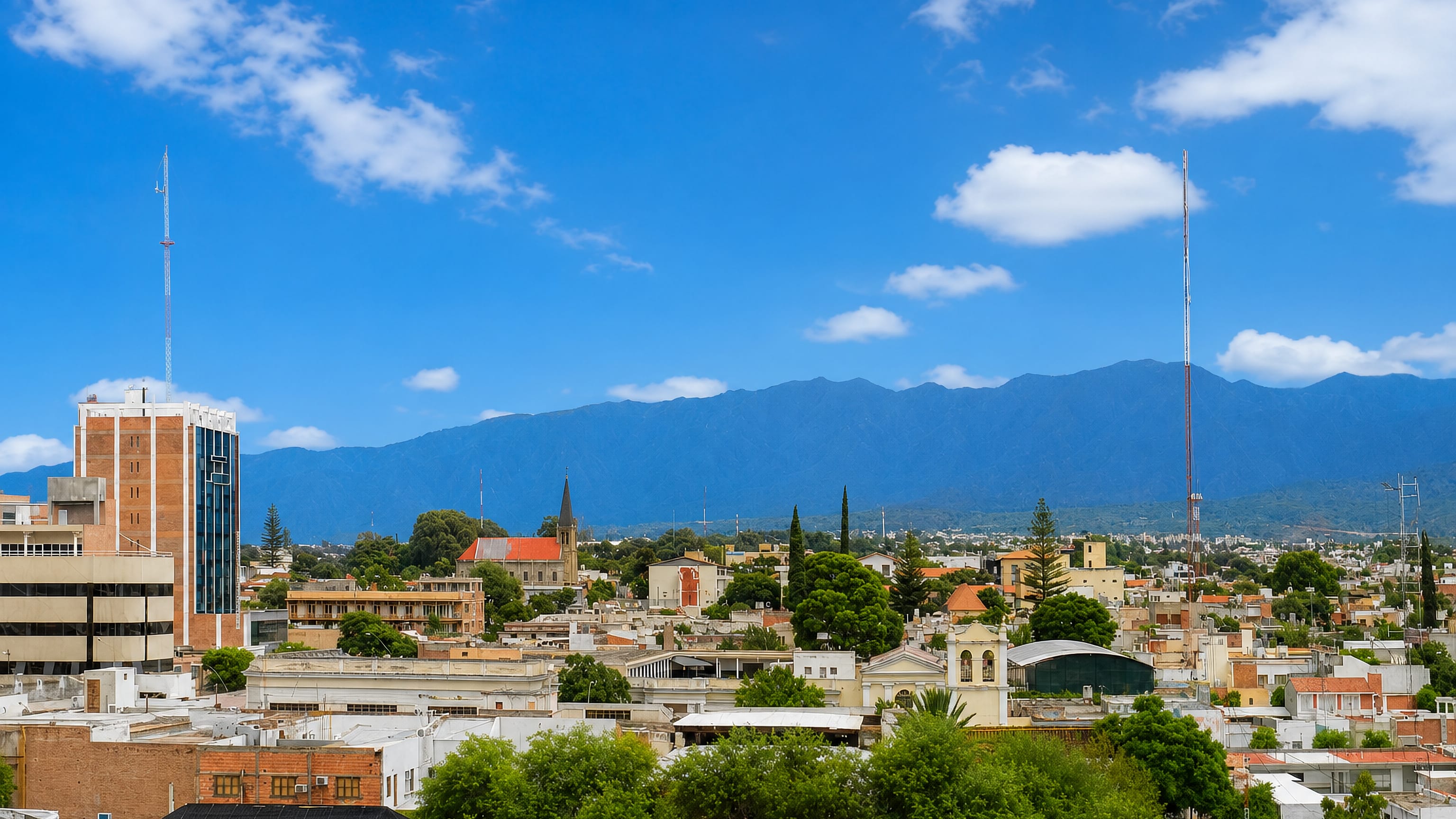 Catamarca's low rooftops, church towers and sierra backdrop in northwestern Argentina.