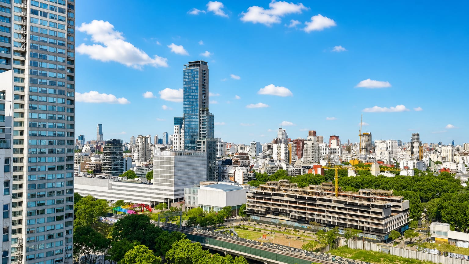 Low-rise tree-lined neighborhood with scattered towers in the Palermo area of Buenos Aires