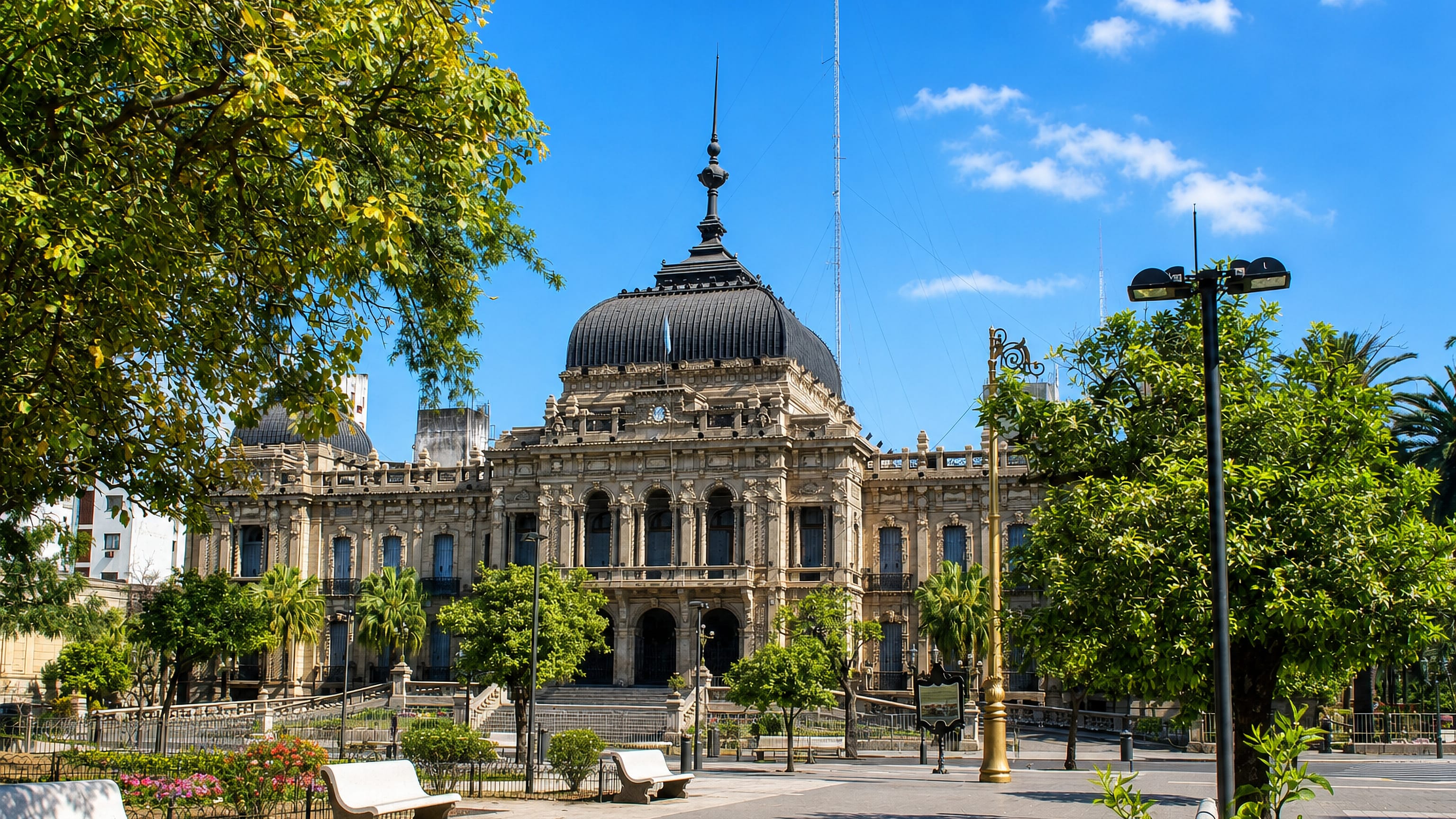 The domed Casa de Gobierno on Plaza Independencia in San Miguel de Tucumán under a clear sky.