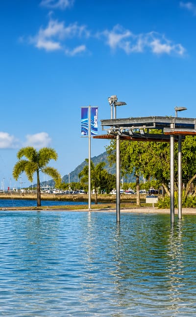 Cairns Esplanade, Queensland, with its fish sculptures and swimming lagoon beside the Coral Sea.