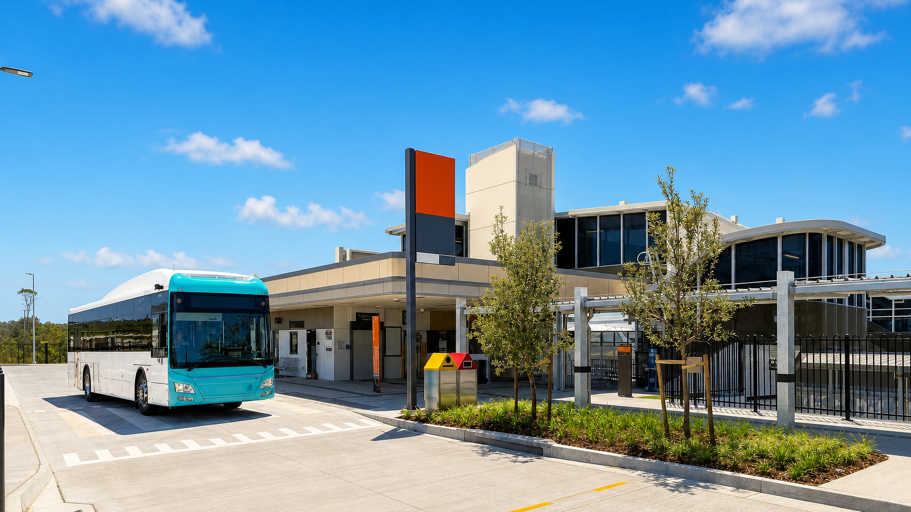Modern transport interchange with a waiting bus at Pimpama on the northern Gold Coast, Queensland.
