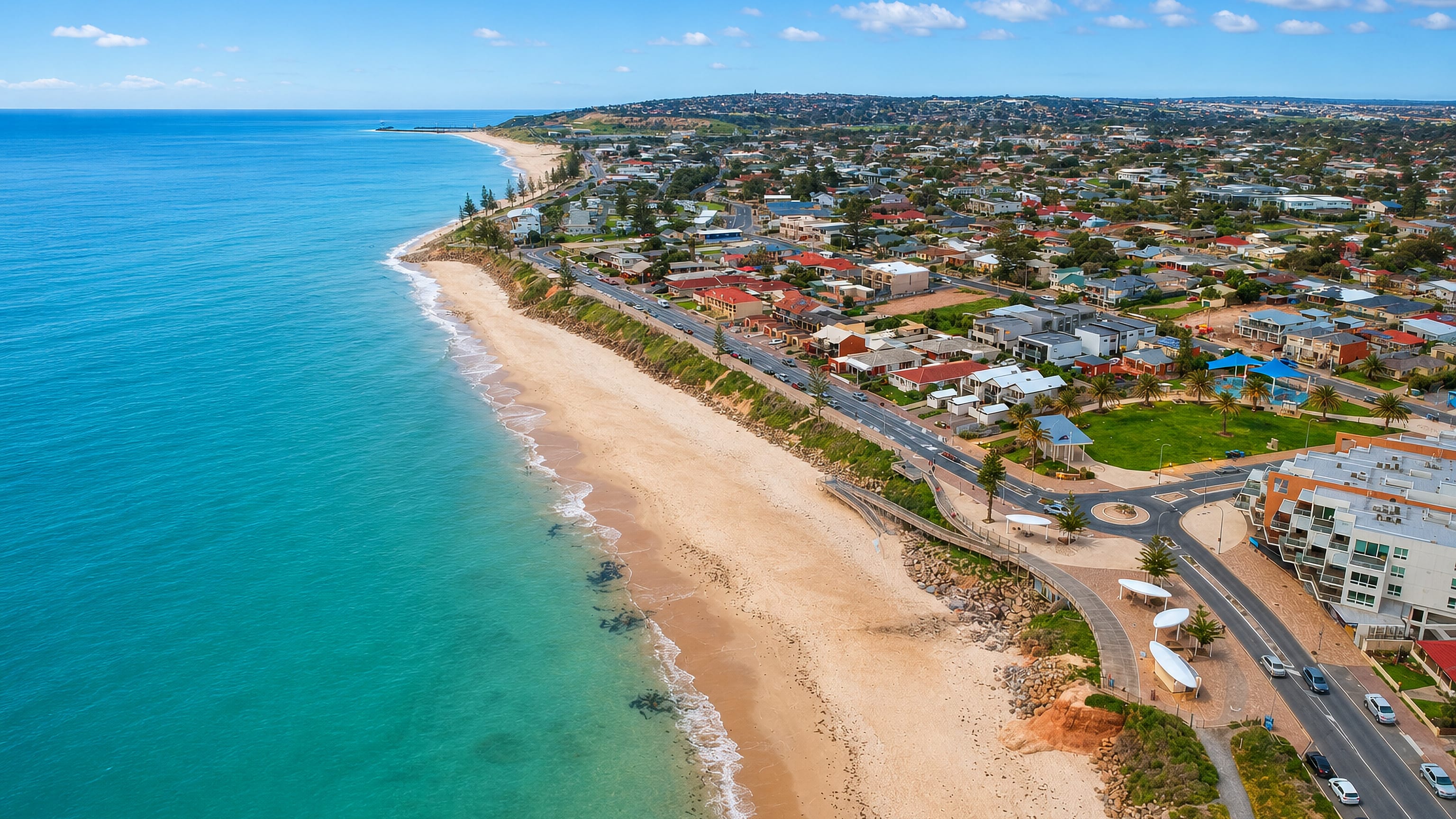 Christies Beach south of Adelaide, its sandy shore and low cliffs below the suburb's streets and esplanade.