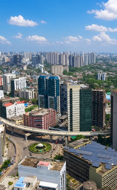 Aerial view of high-rise office towers and a flyover in Motijheel, the central business district of Dhaka, Bangladesh