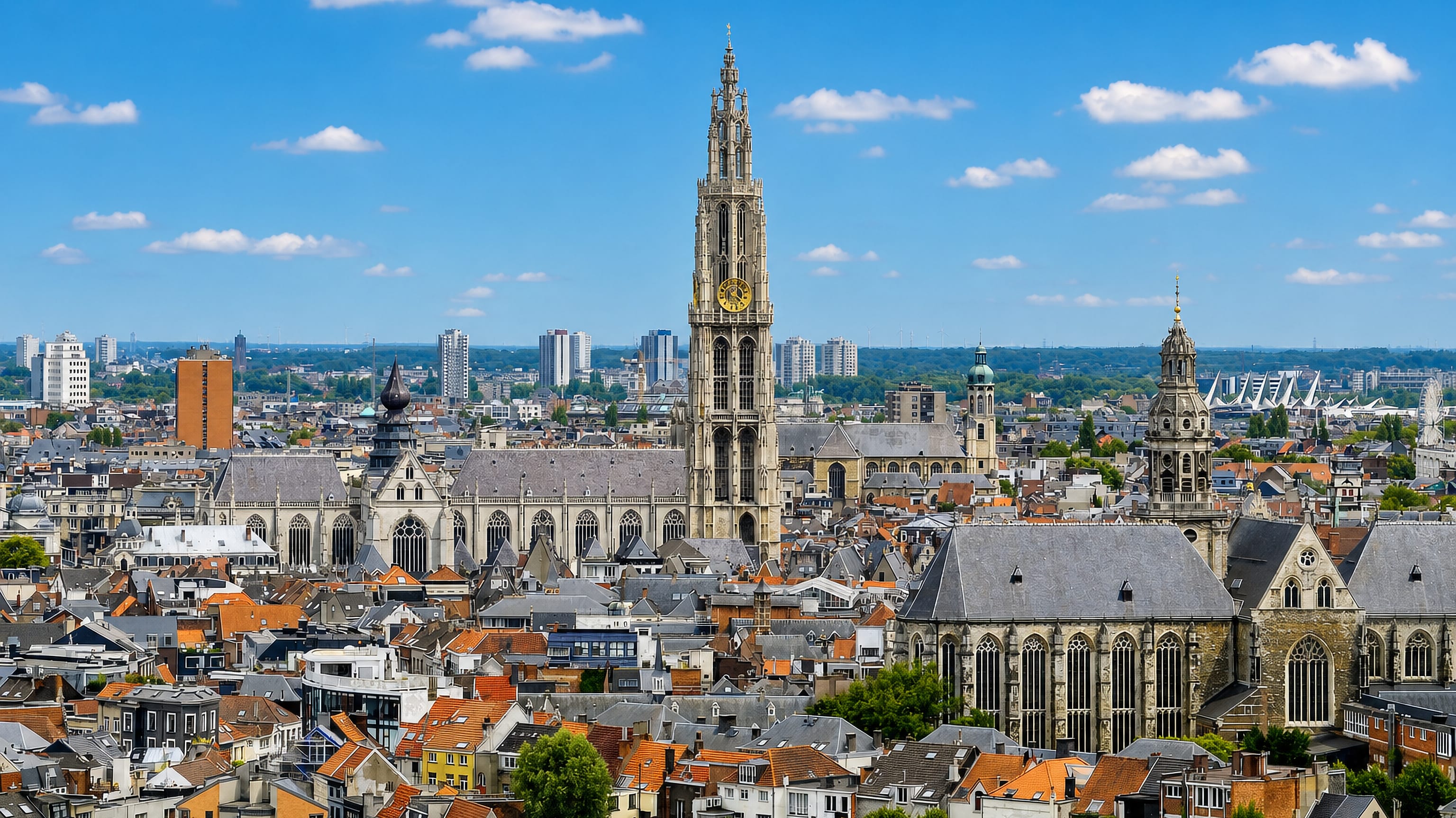 Antwerp's old town rooftops beneath the Gothic tower of the Cathedral of Our Lady and St Paul's Church.