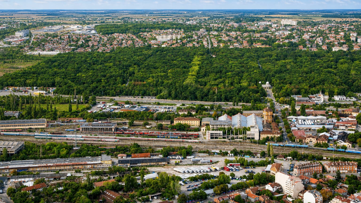 Aerial view of the marshalling rail yards and low-rise buildings of Sofia's Orlandovtsi district