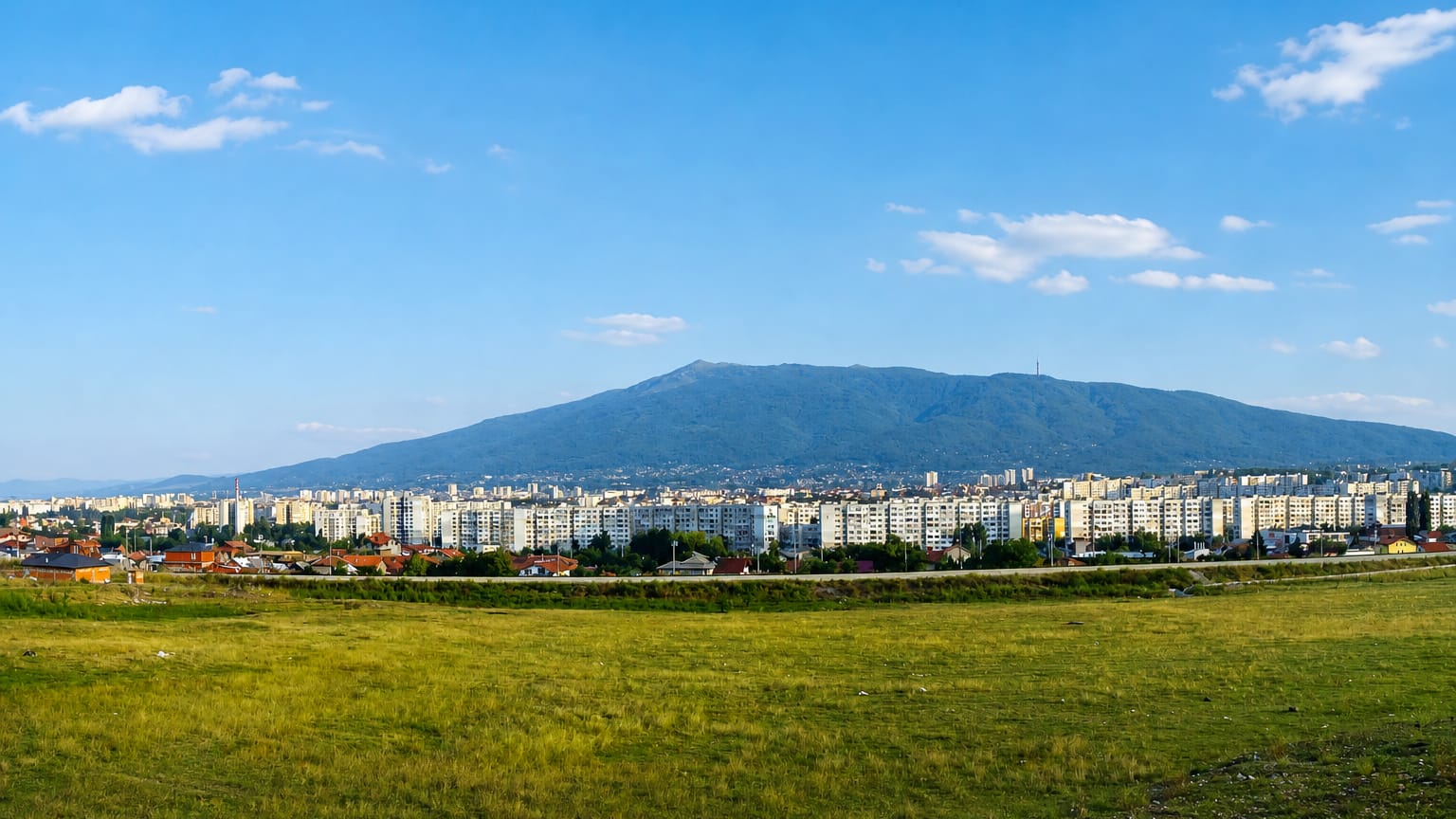 Low-rise residential Ovcha kupel district spread beneath Vitosha mountain in Sofia