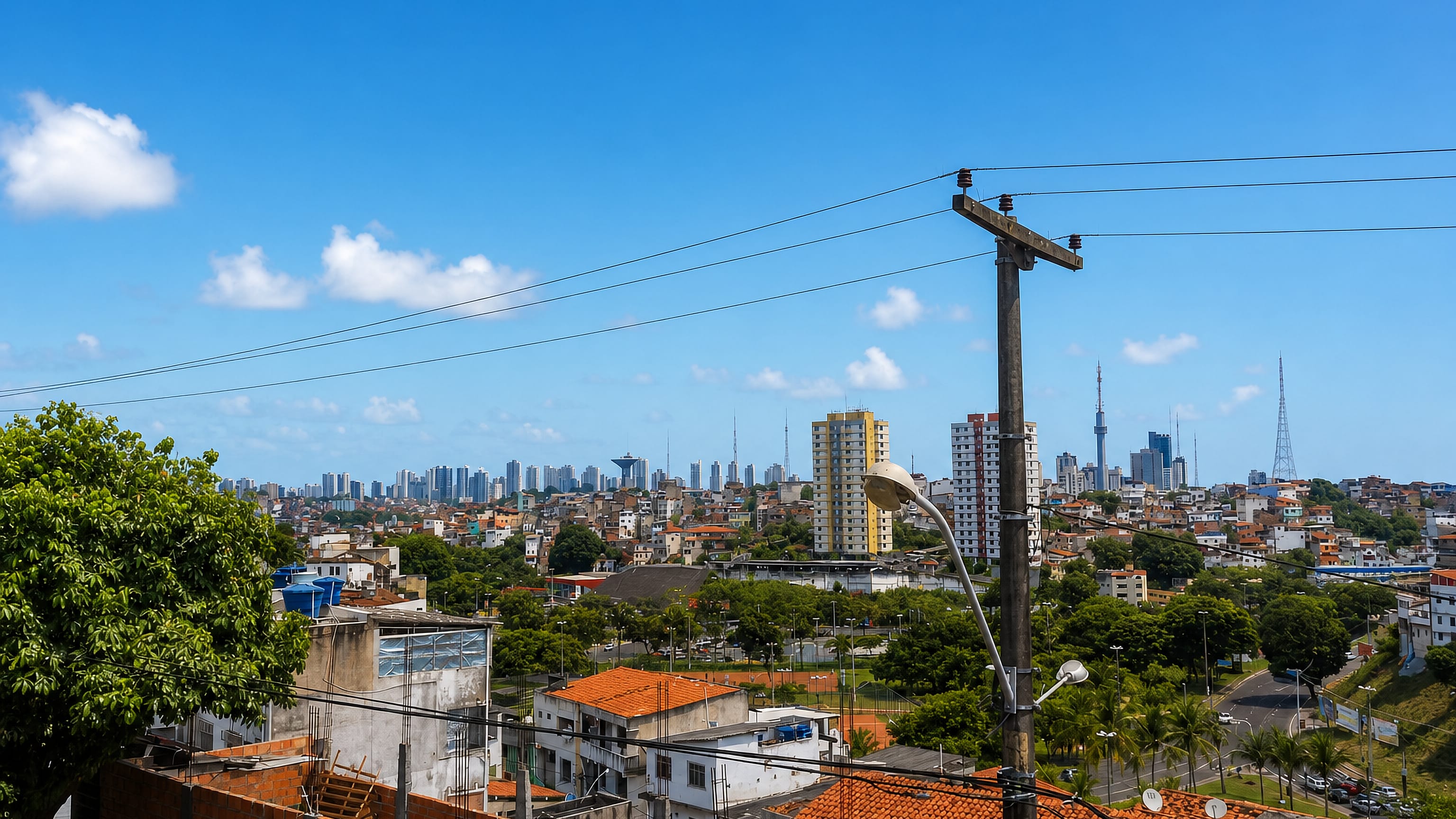 Hillside rooftops and the downtown skyline seen from Barris in Salvador, Bahia.