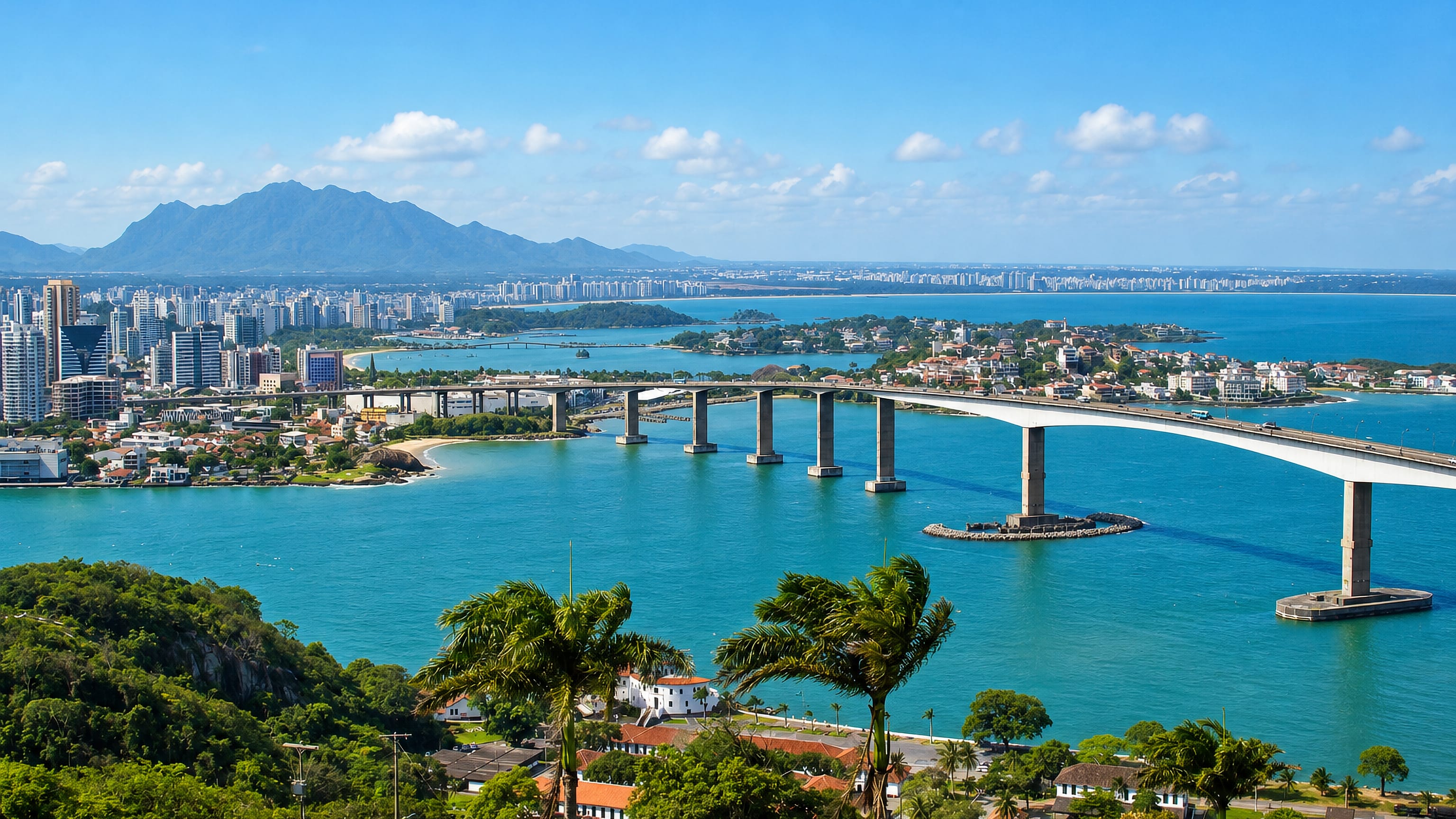 Vitória, Brazil, seen across the bay with the Third Bridge curving toward the city's high-rise waterfront
