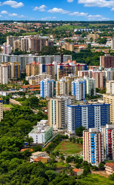 Aerial view of Caldas Novas, Goias, with its dense cluster of colourful thermal-resort towers among green hills