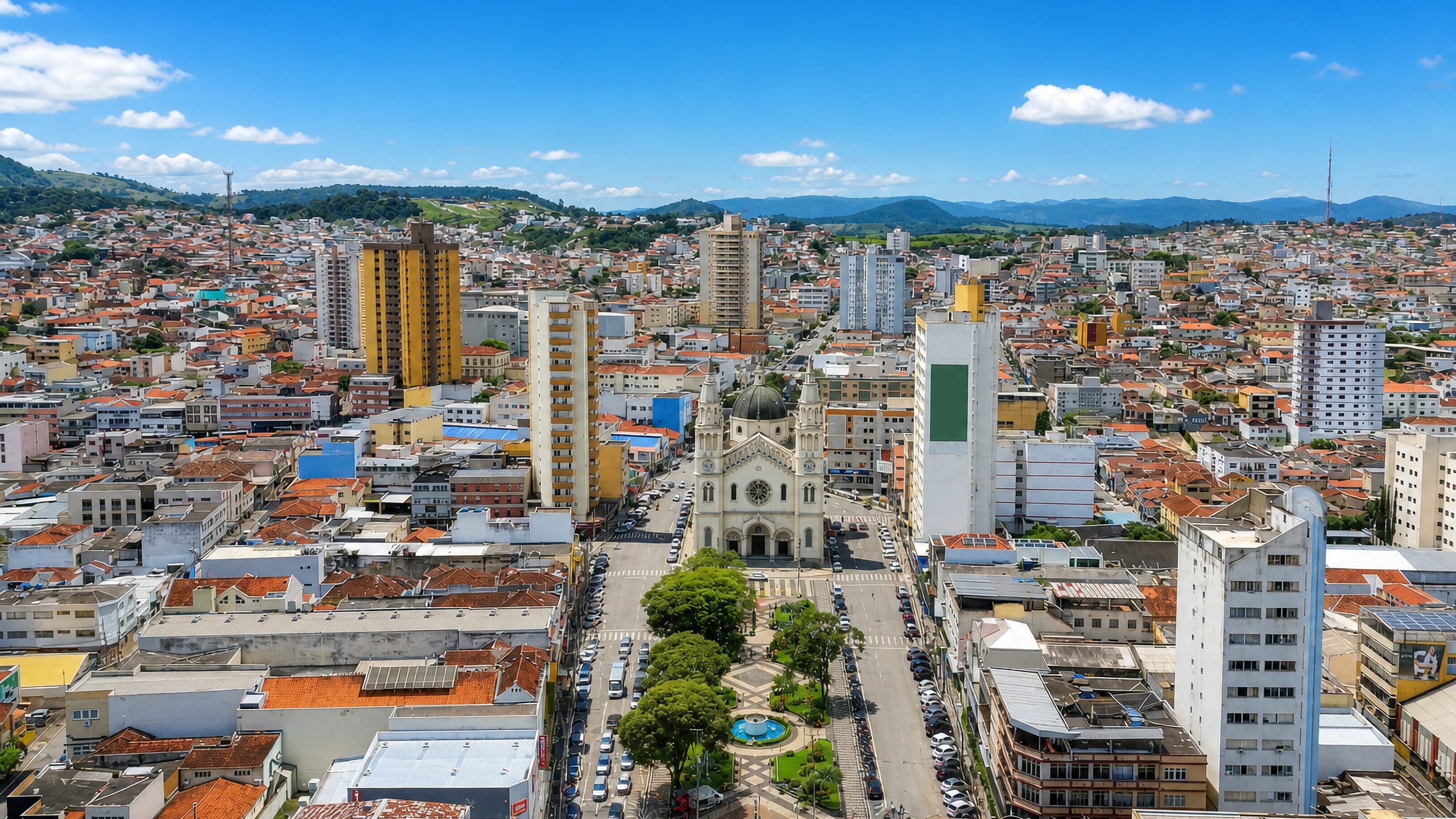 Aerial view of central Pouso Alegre, Minas Gerais, with its domed cathedral above the tree-filled main square