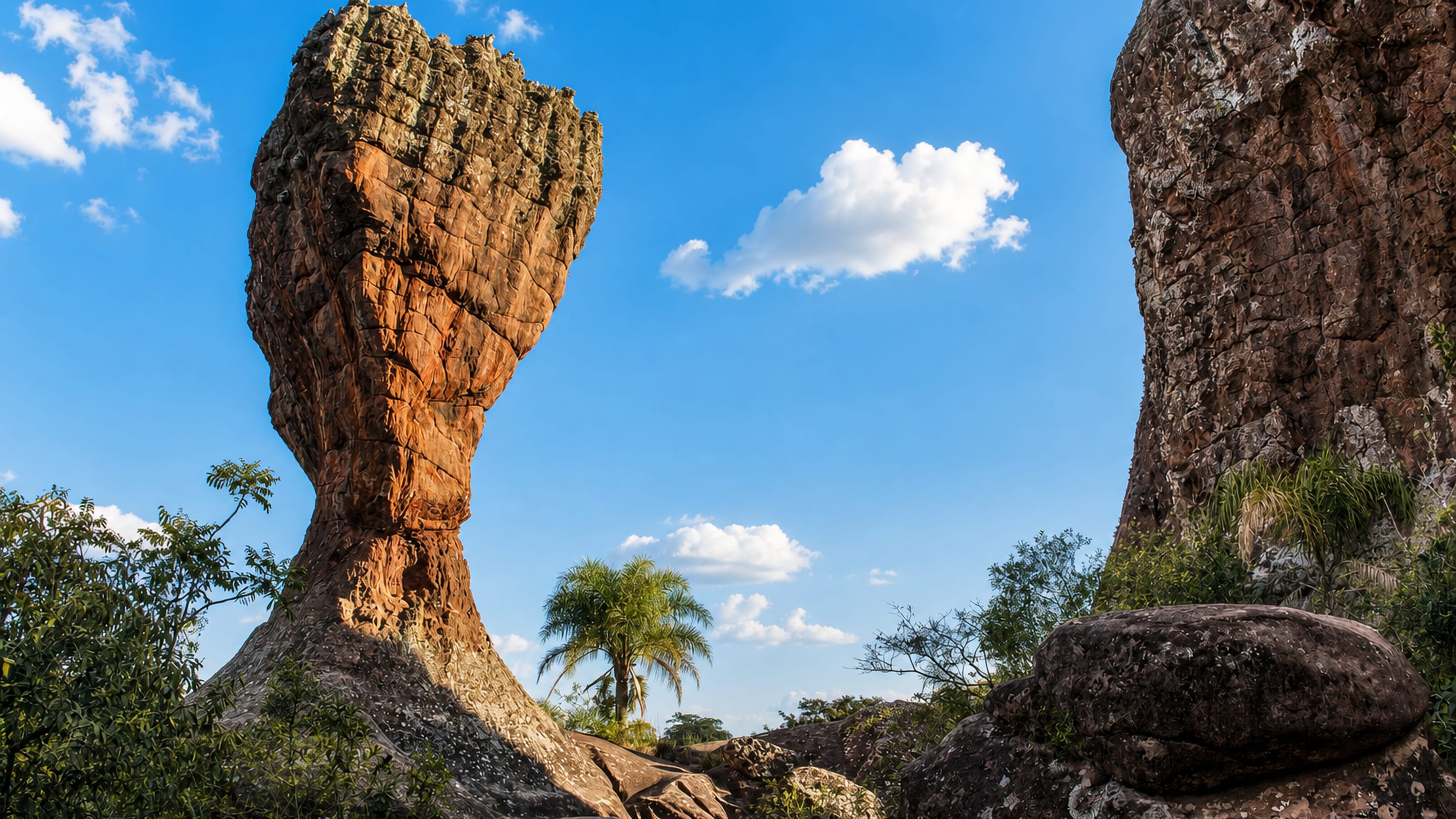 The goblet-shaped sandstone pillar of Vila Velha park at Ponta Grossa, Brazil, under a blue sky.