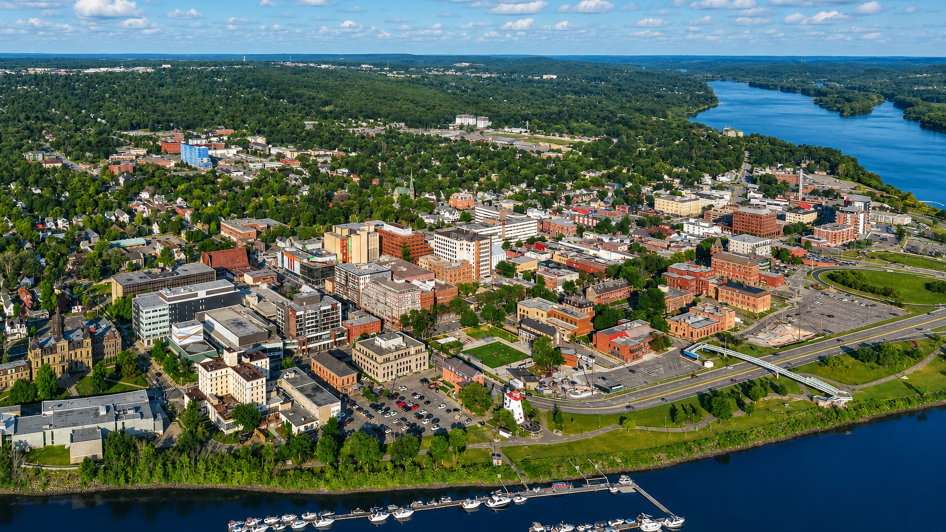 Aerial view of downtown Fredericton, New Brunswick, along the Saint John River with its marina and riverfront.