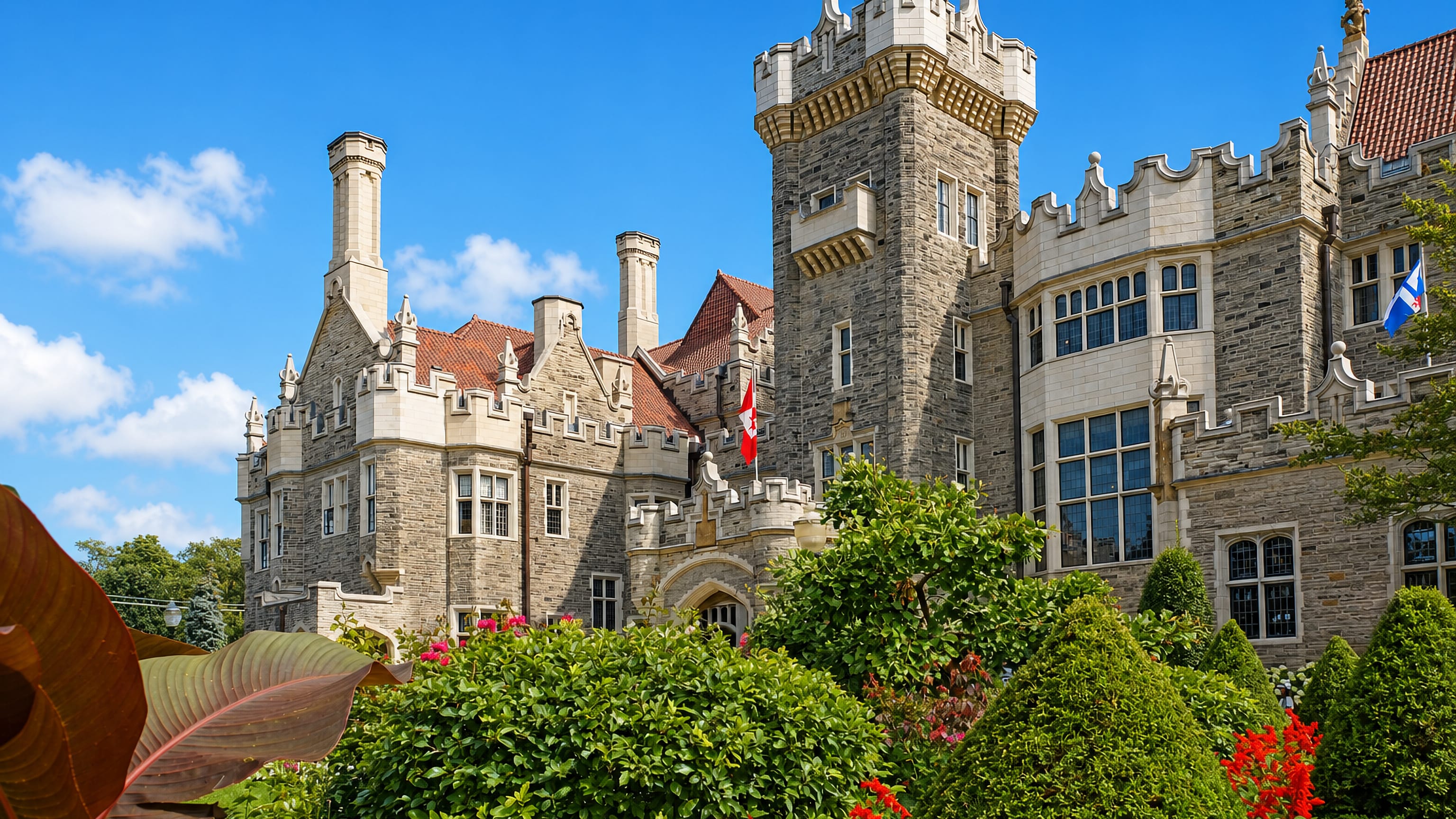Casa Loma's Gothic Revival turrets and stone facade rising above terraced gardens in Toronto.