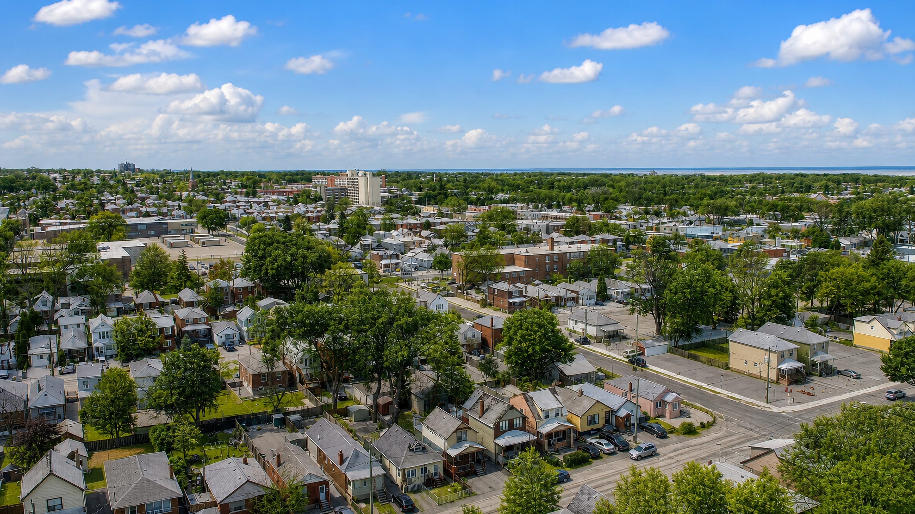 Oakridge in east Toronto, tree-lined streets of detached homes running toward Lake Ontario.