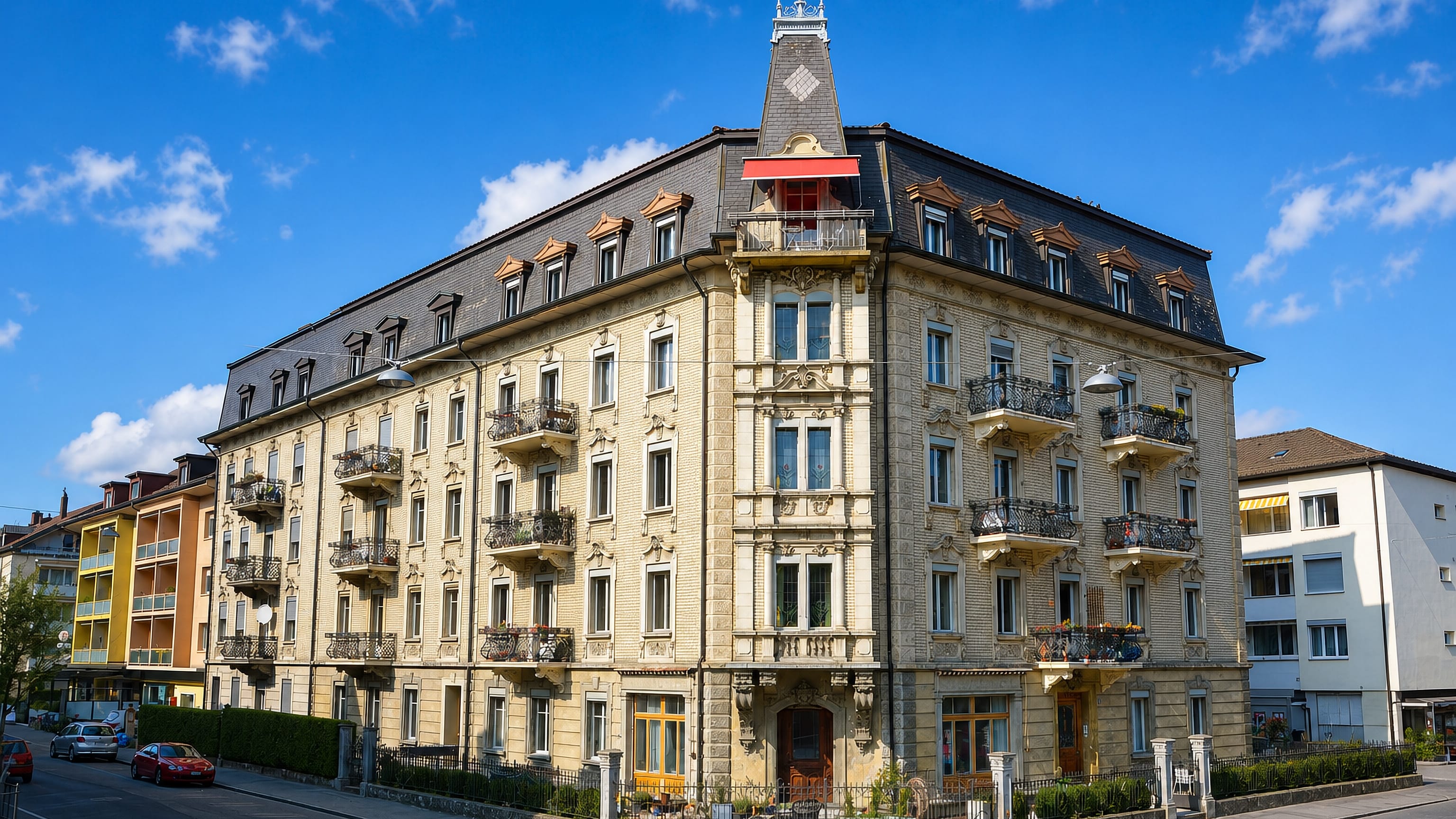 Ornate corner apartment block with turret and iron balconies in the Muesmatt quarter of Bern.
