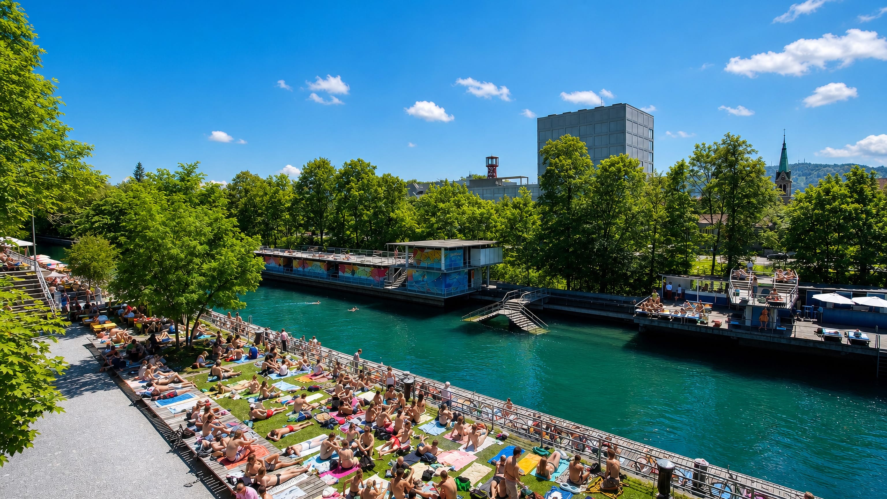 Sunbathers line the decks of the Flussbad Oberer Letten beside the turquoise Limmat in Zurich.