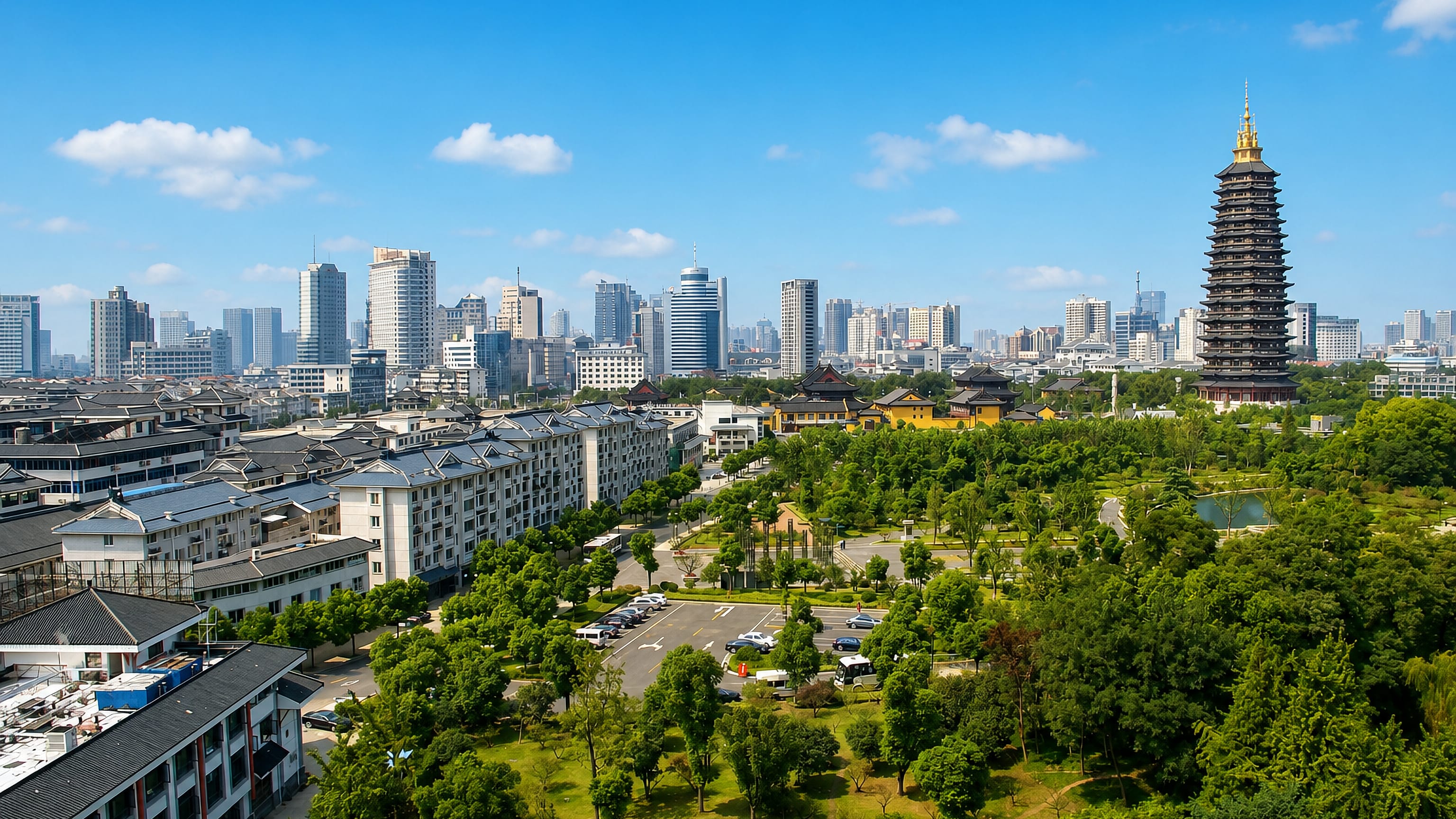 Changzhou's Tianning Pagoda towering over temple roofs, green parkland and the modern downtown skyline, Jiangsu