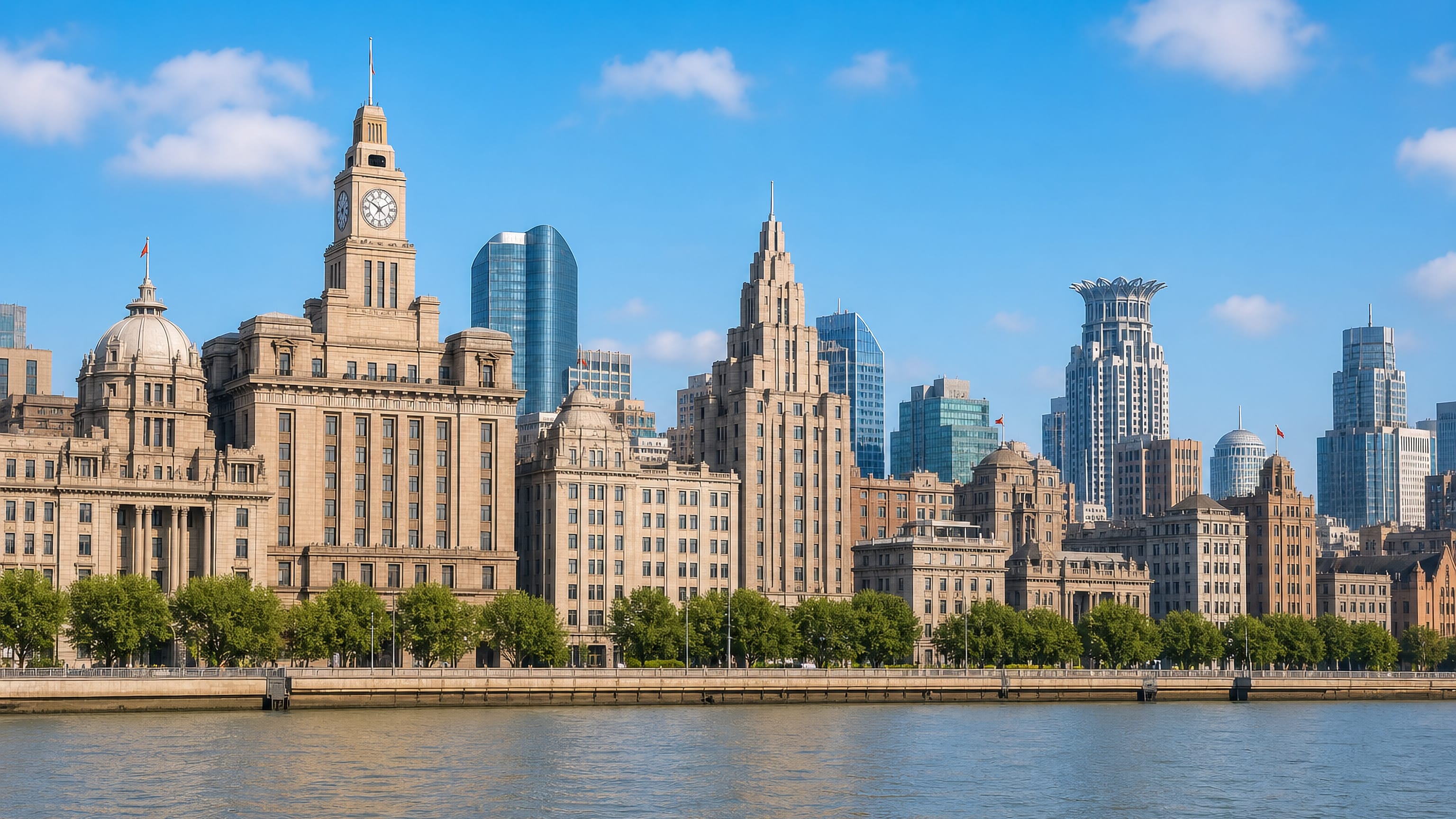 Colonial-era stone facades and a riverside clock tower along the Huangpu waterfront in central Shanghai