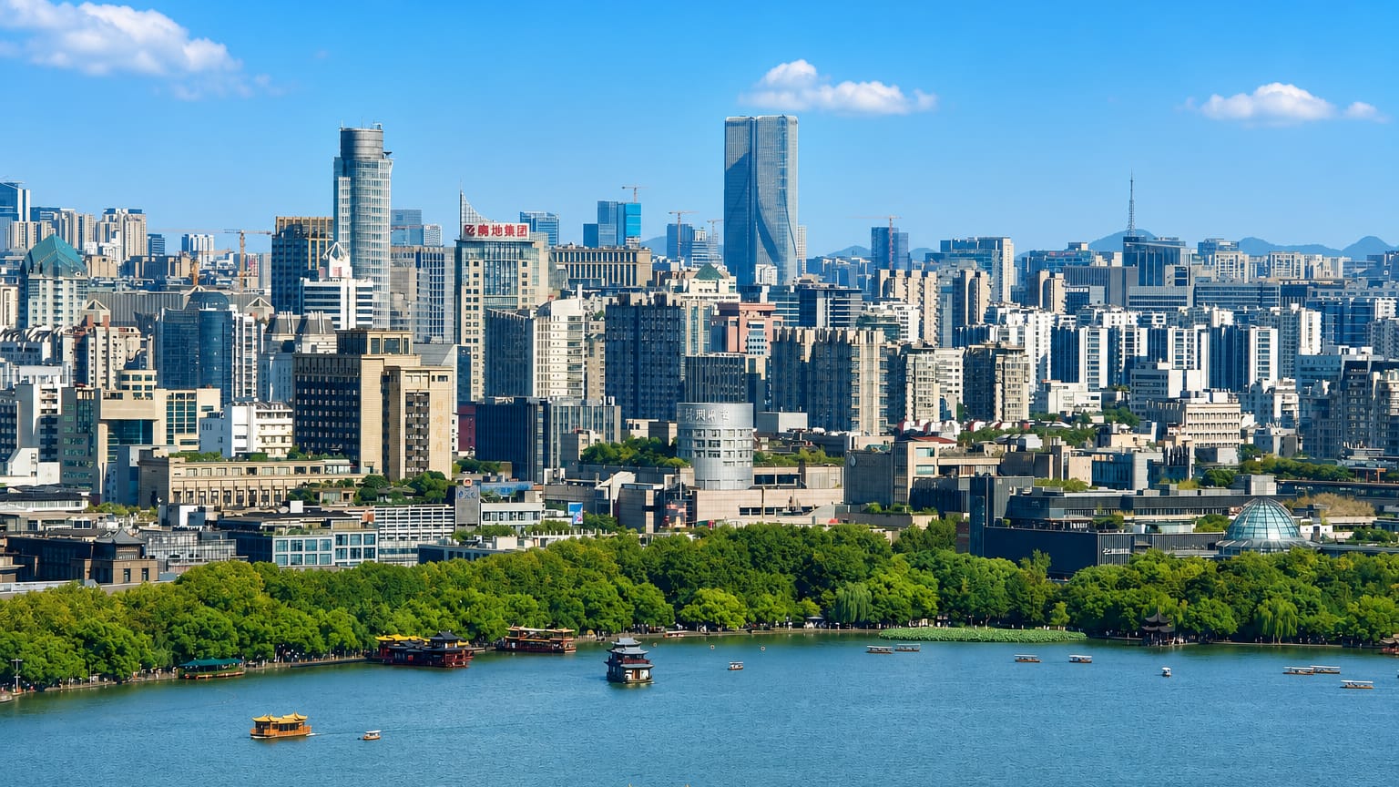 Hangzhou's modern skyline rising behind West Lake with traditional pleasure boats on the water