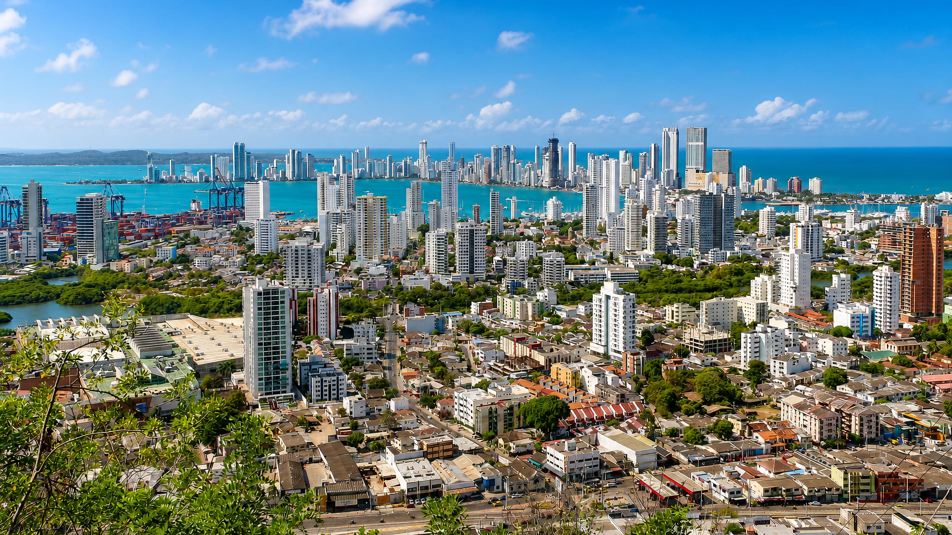 Elevated view over Cartagena, Colombia, with Bocagrande's high-rise skyline, the Caribbean bay and container port