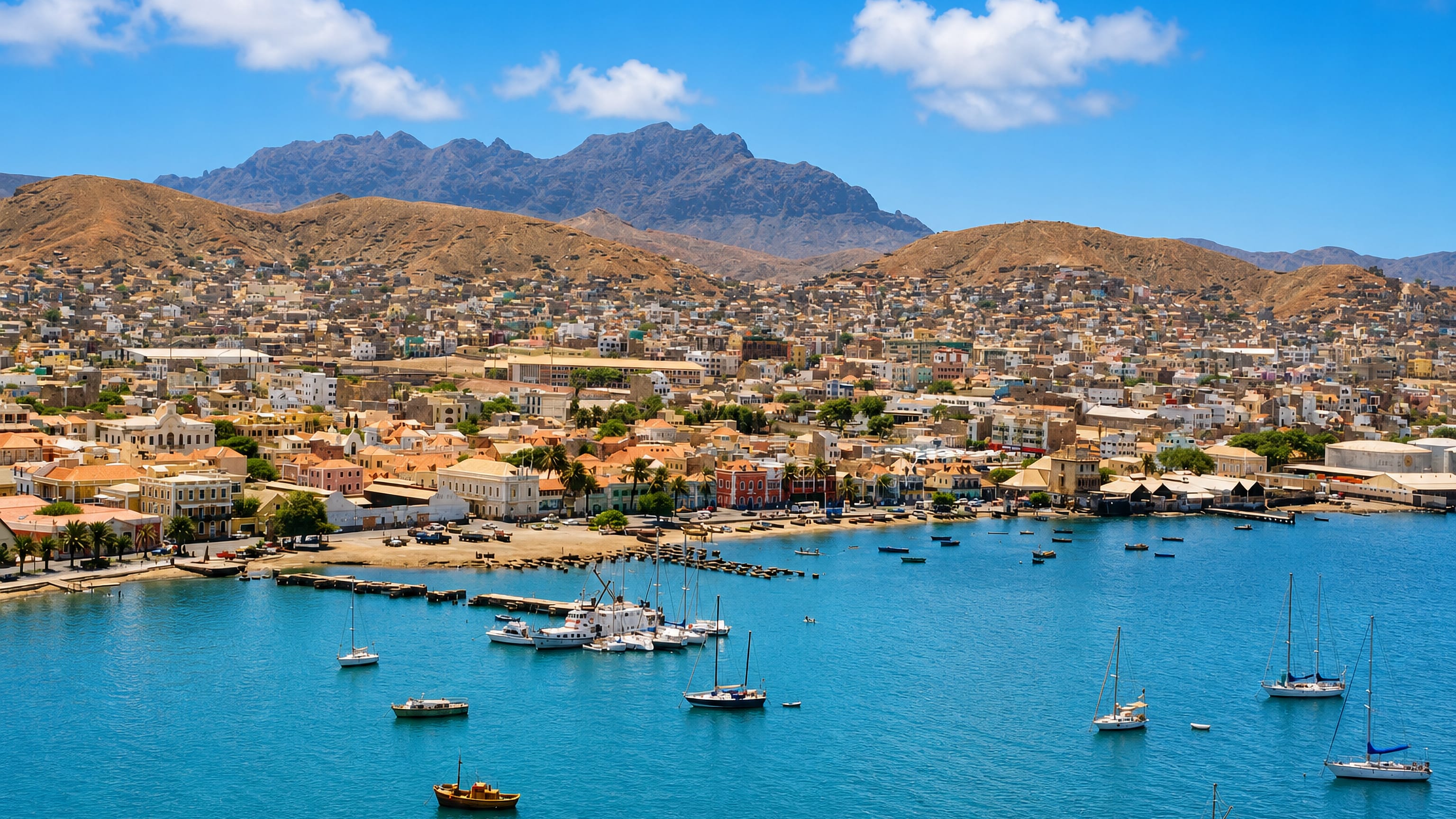 Mindelo, Cape Verde, its pastel colonial waterfront and Porto Grande bay below arid volcanic ridges.