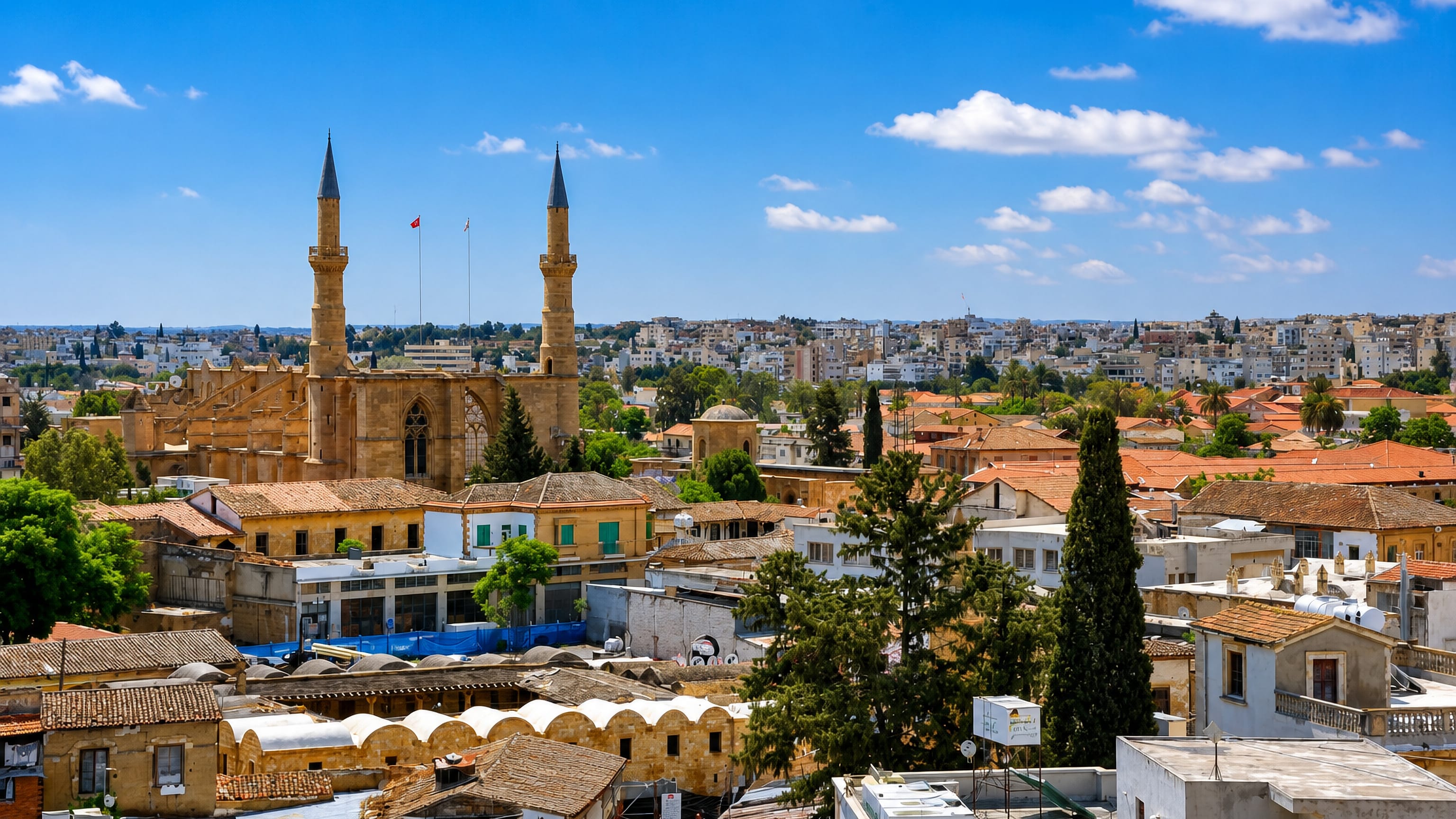 Nicosia old town with the twin minarets of the Selimiye Mosque rising over terracotta rooftops