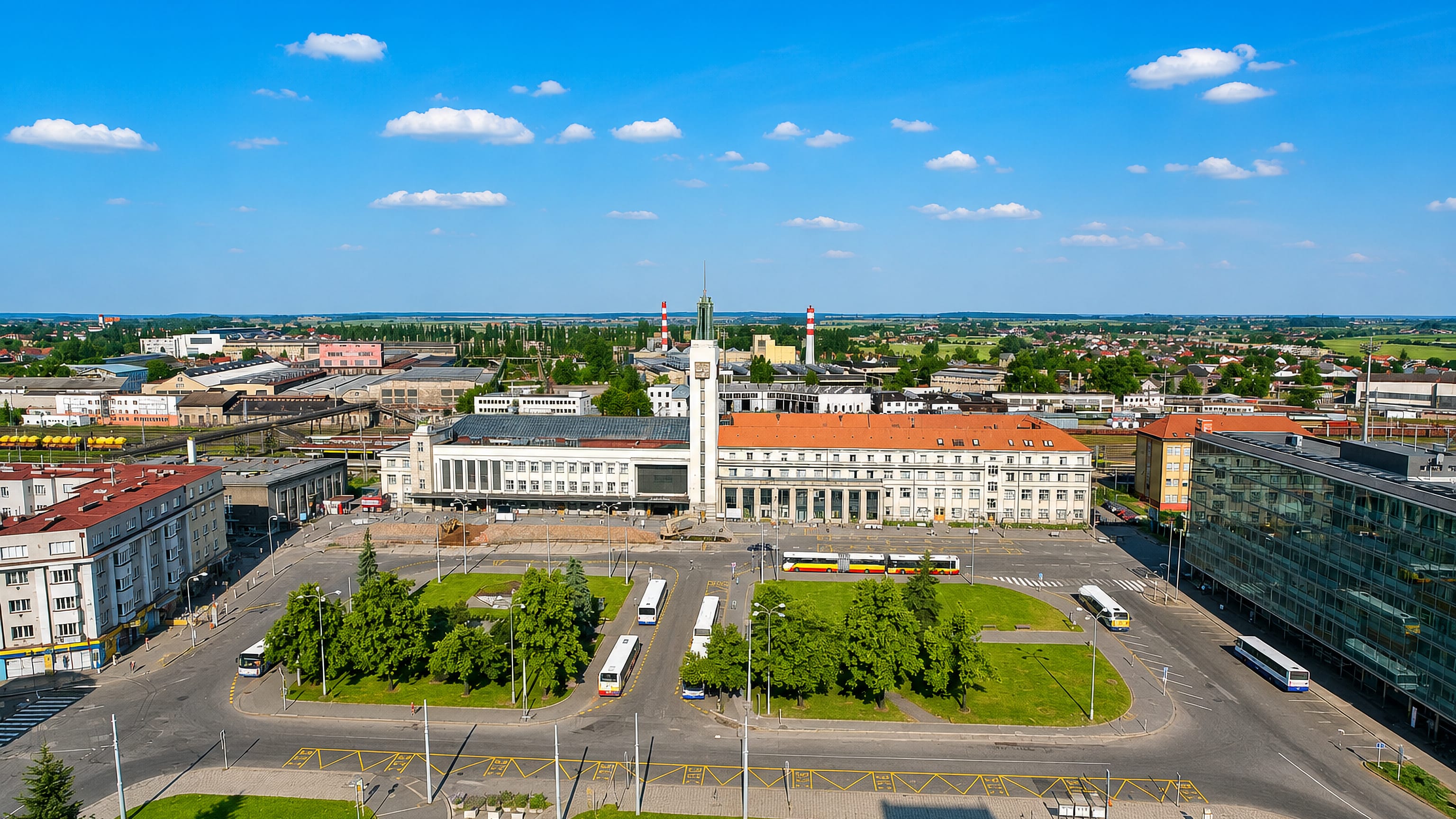 Hradec Králové main station and its clock tower seen from above in the Pražské Předměstí district.