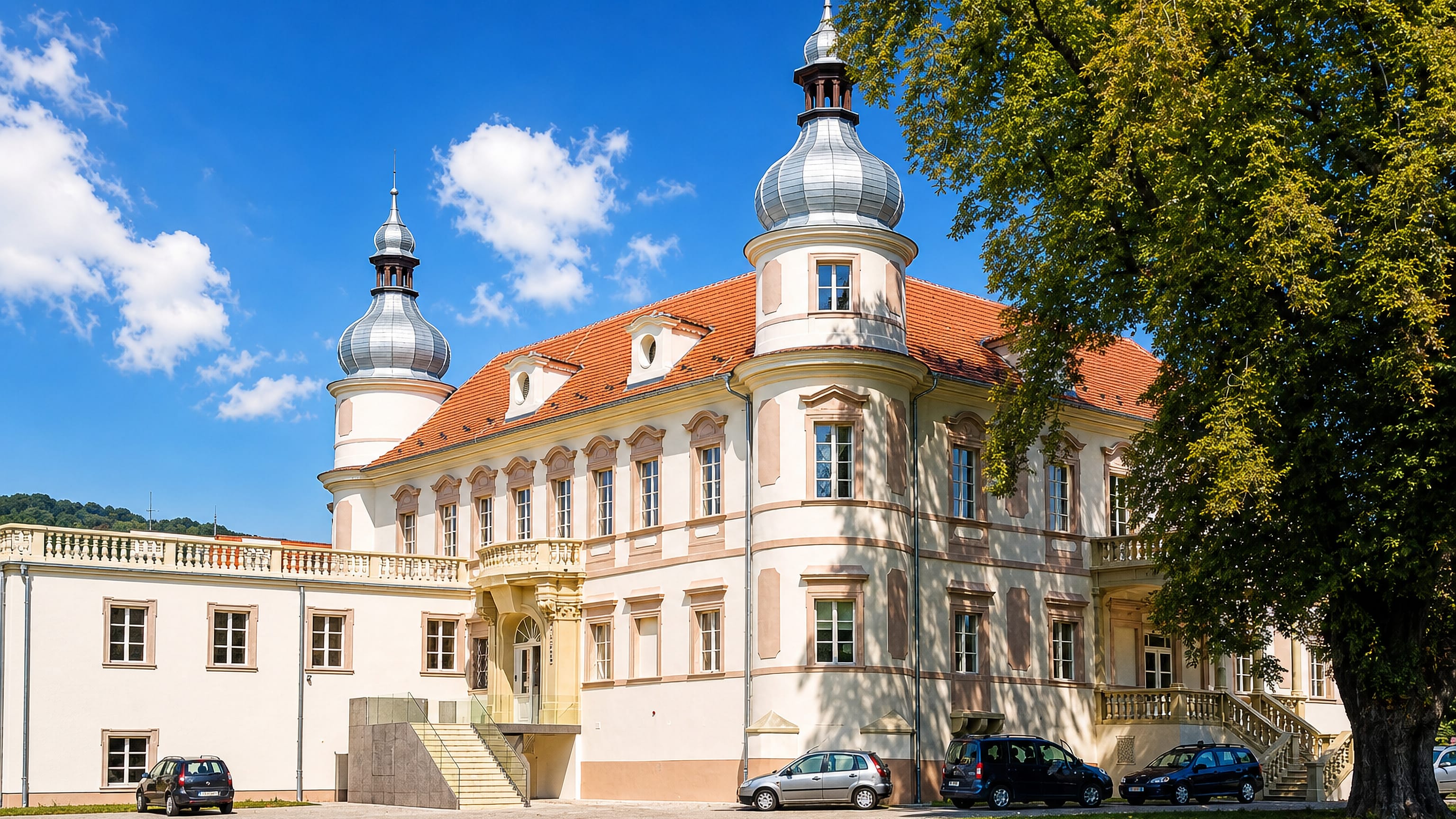 A baroque onion-domed chateau with red-tiled roofs in Krásné Březno, a district of Ústí nad Labem.