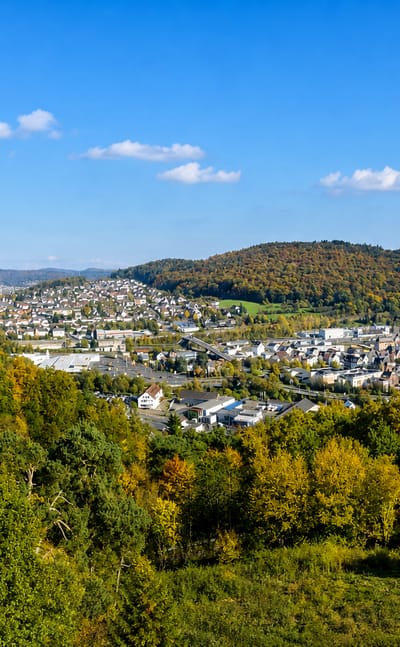 Autumn view over the small town of Alsbach nestled among wooded hills in Hessen