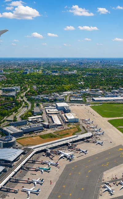 Aerial view over Hamburg Airport in the Fuhlsbüttel district, with terminals, aprons and parked aircraft