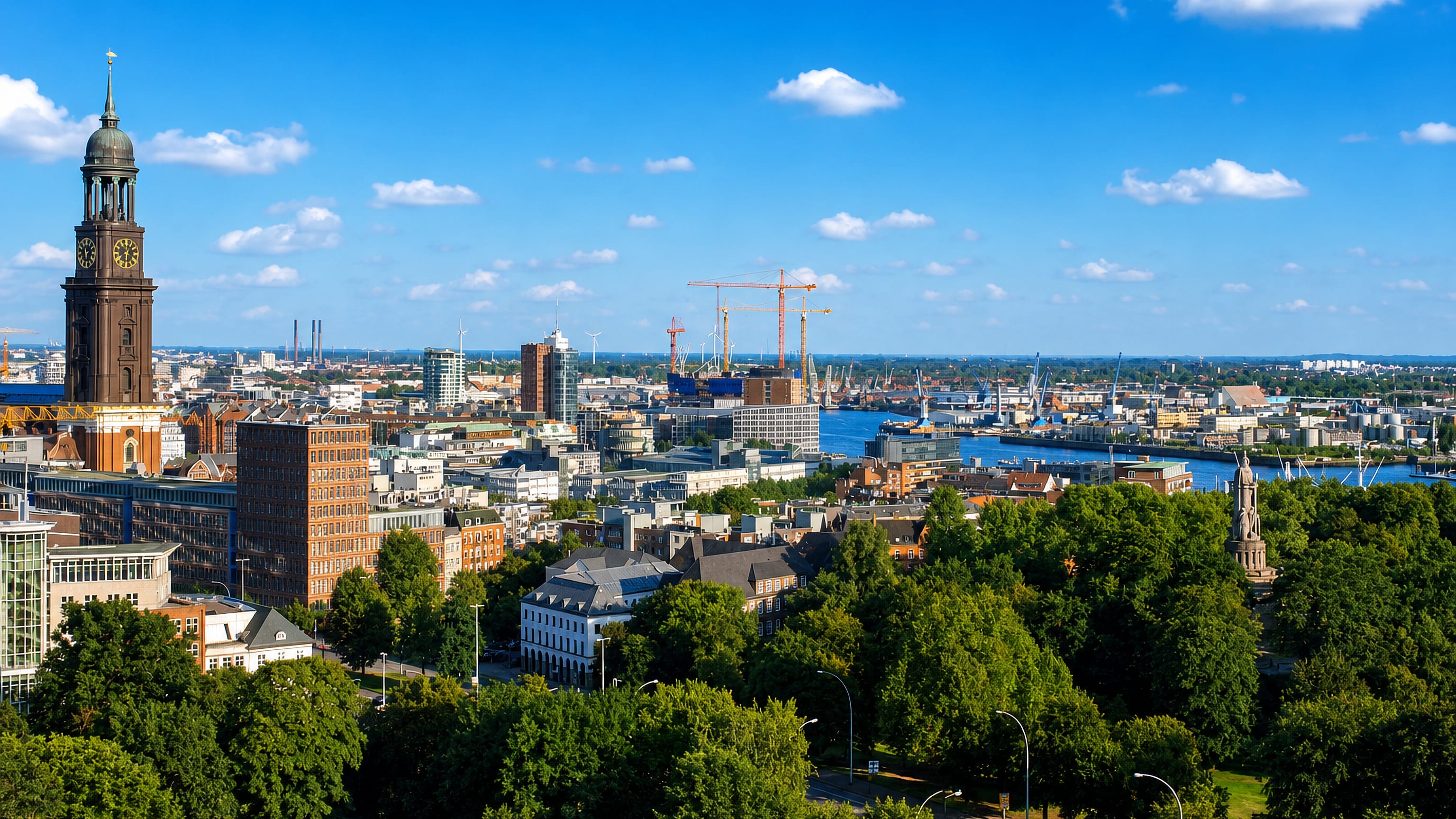Hamburg's Neustadt from above, the St. Michaelis church tower rising over rooftops toward the Elbe harbour cranes.