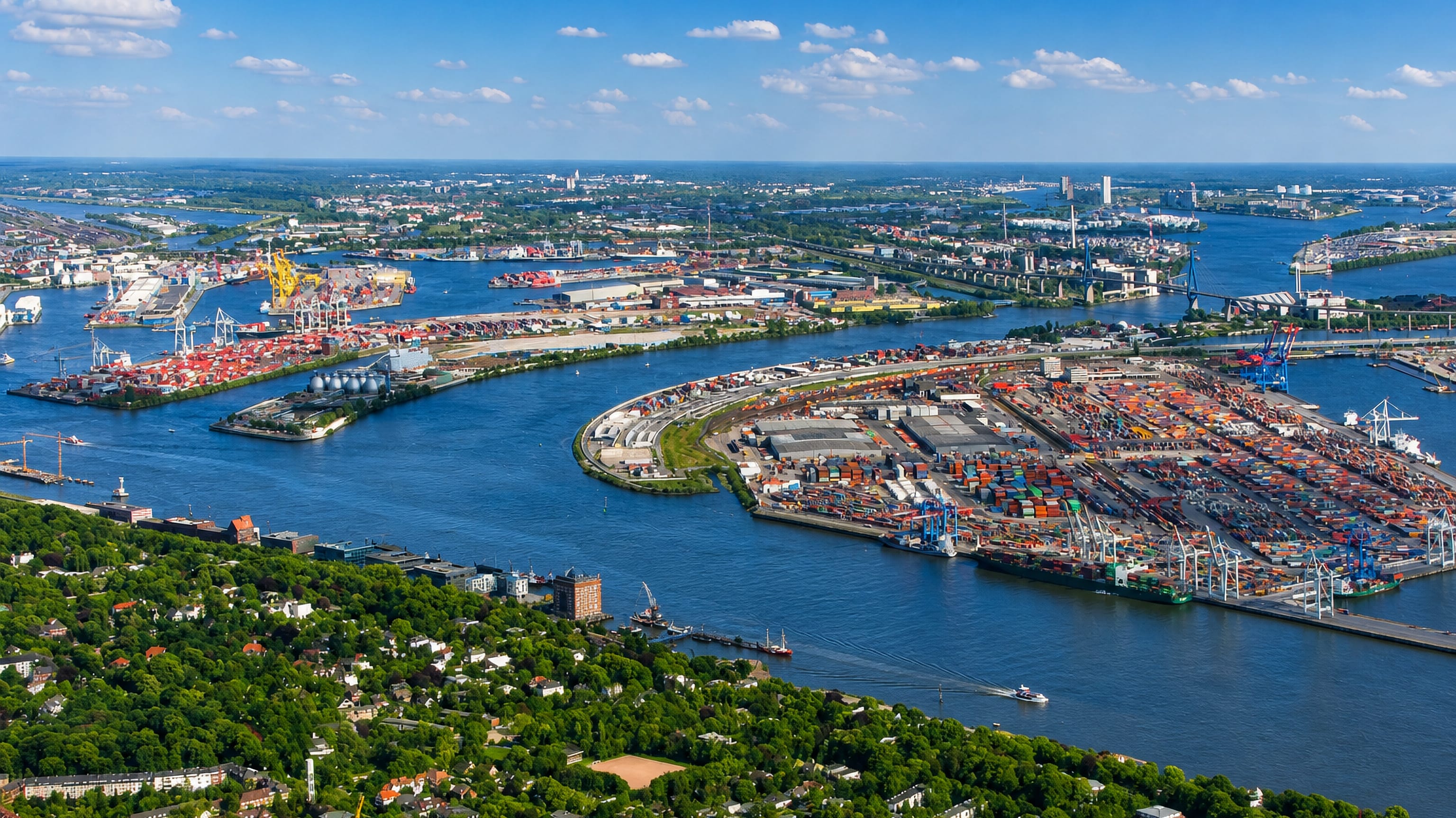 Hamburg's container port and the Elbe seen across the wooded Altona slopes below Ottensen.