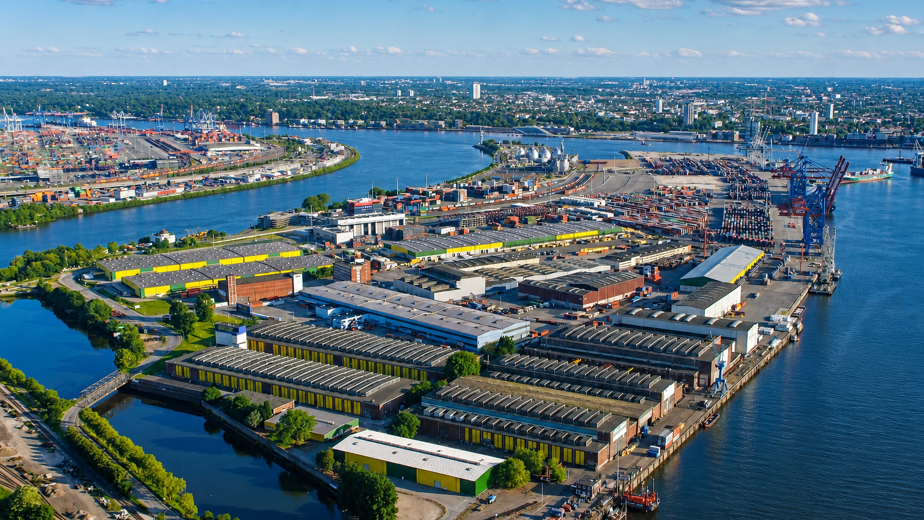 Aerial view of Steinwerder's warehouses, quays and container cranes in Hamburg's port on the Elbe
