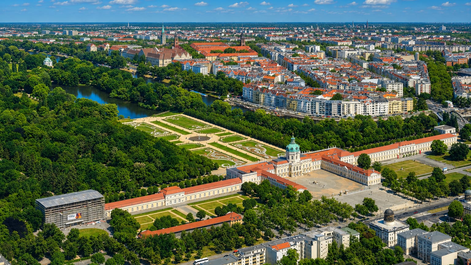 Aerial view of Charlottenburg Palace and its baroque gardens amid the red-roofed Berlin cityscape in Charlottenburg