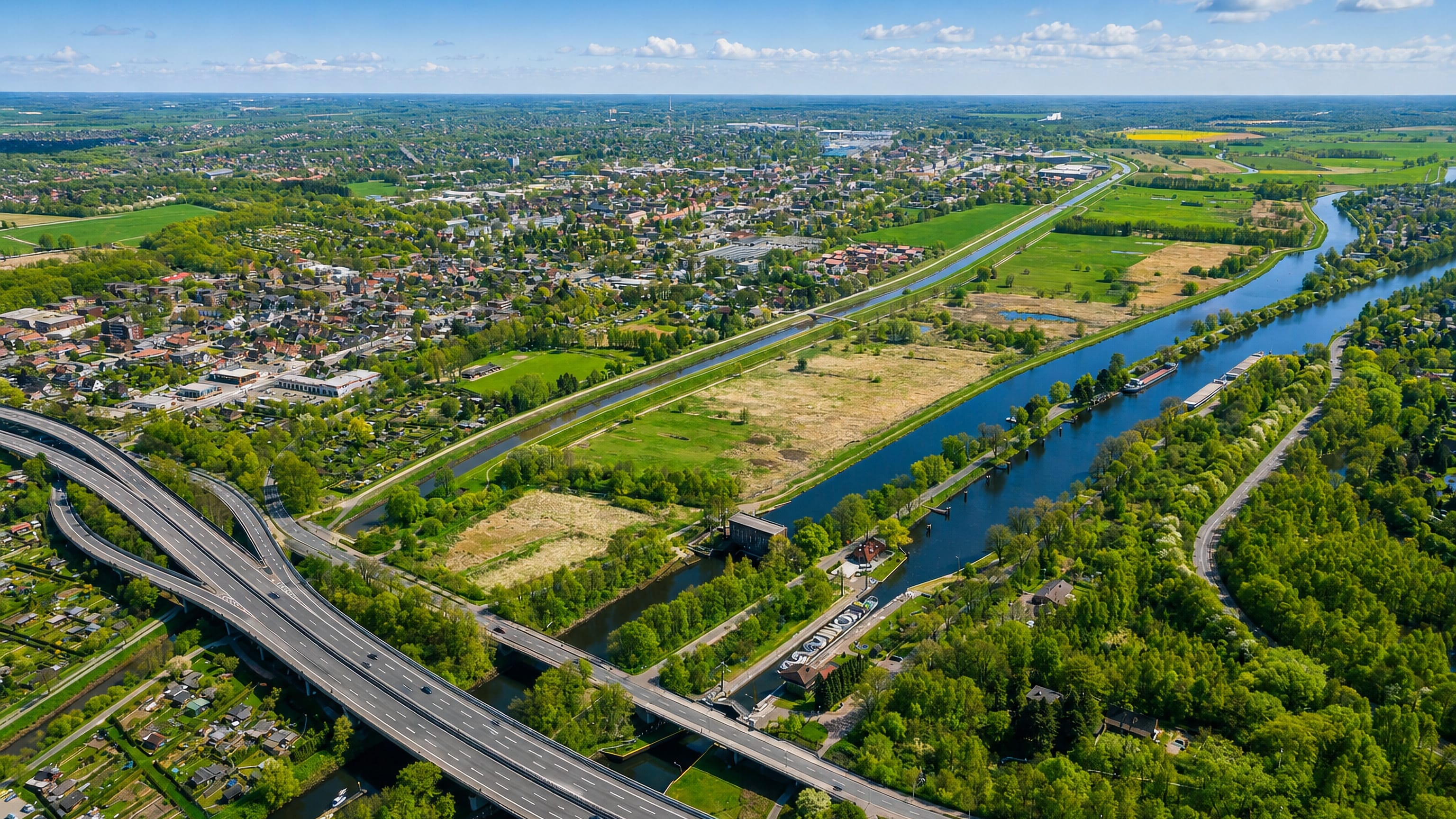 Aerial view of Kreyenbruck in southern Oldenburg, with the motorway crossing the river and canal.