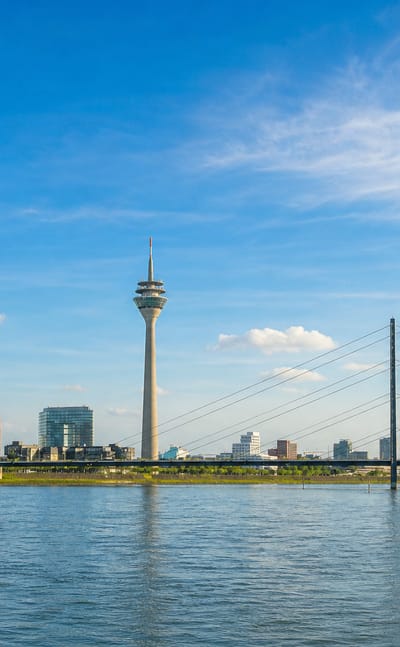 The Rheinturm tower and the Rheinkniebrücke cable bridge over the Rhine on the Düsseldorf skyline