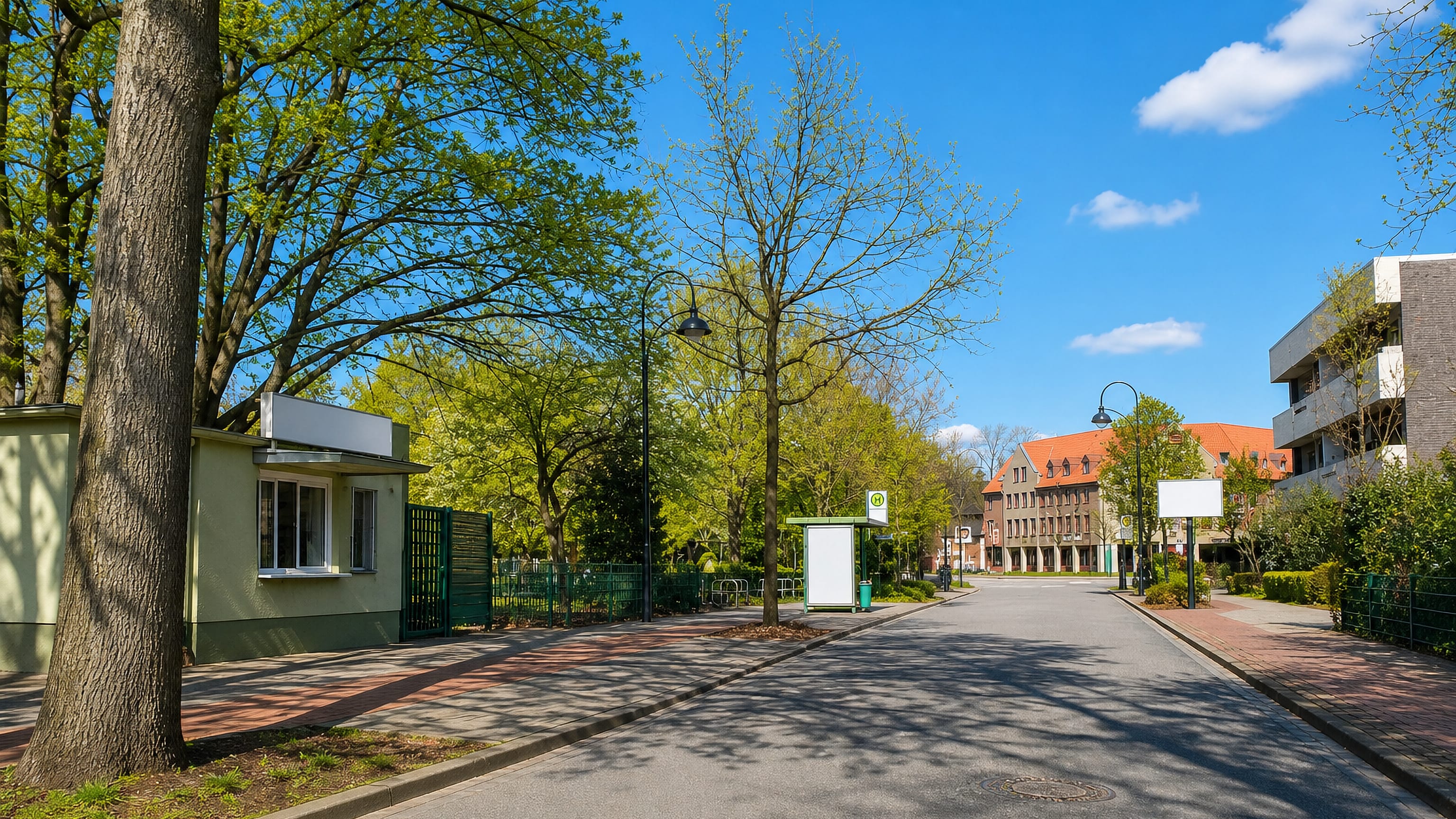 Tree-lined residential street with a bus stop and brick townhouses in Bockum-Hövel, Hamm.