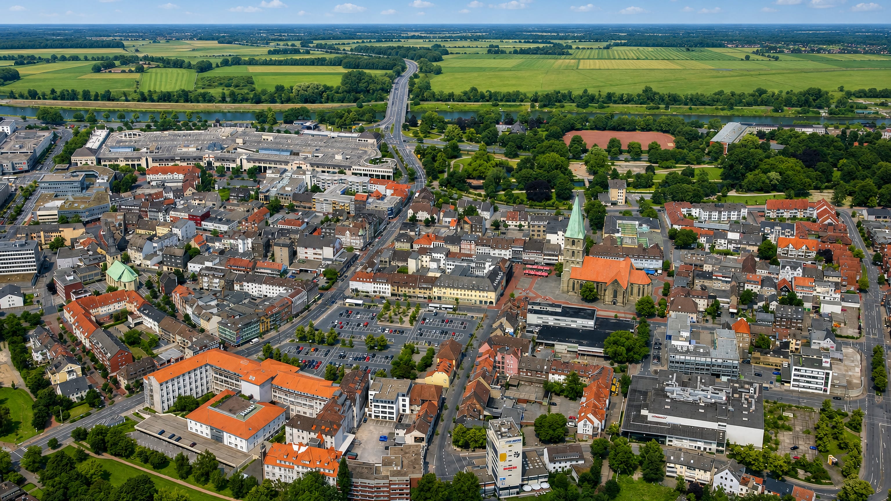 Aerial view of Hamm's town centre, its green-spired church and the surrounding Westphalian farmland