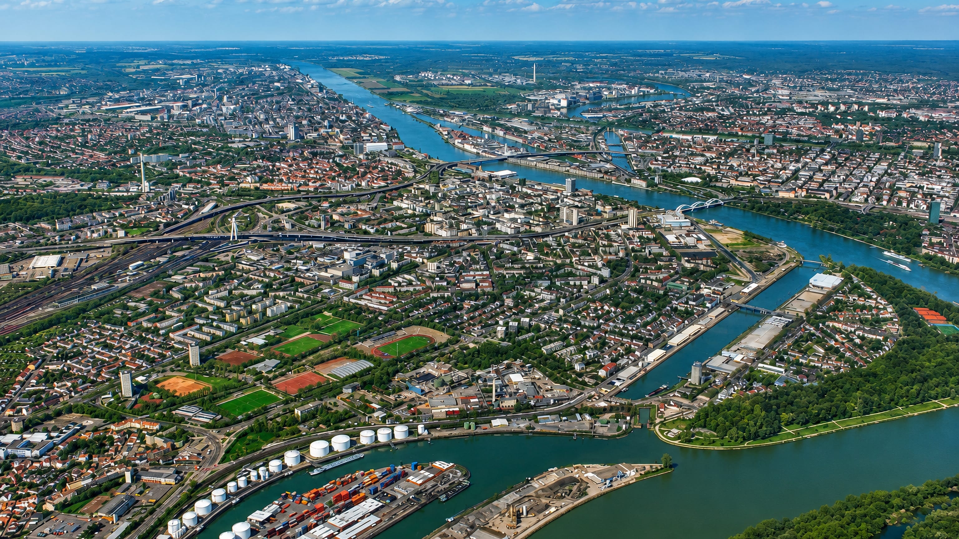 Aerial view of Ludwigshafen am Rhein with its Rhine harbour, container terminal and elevated highways
