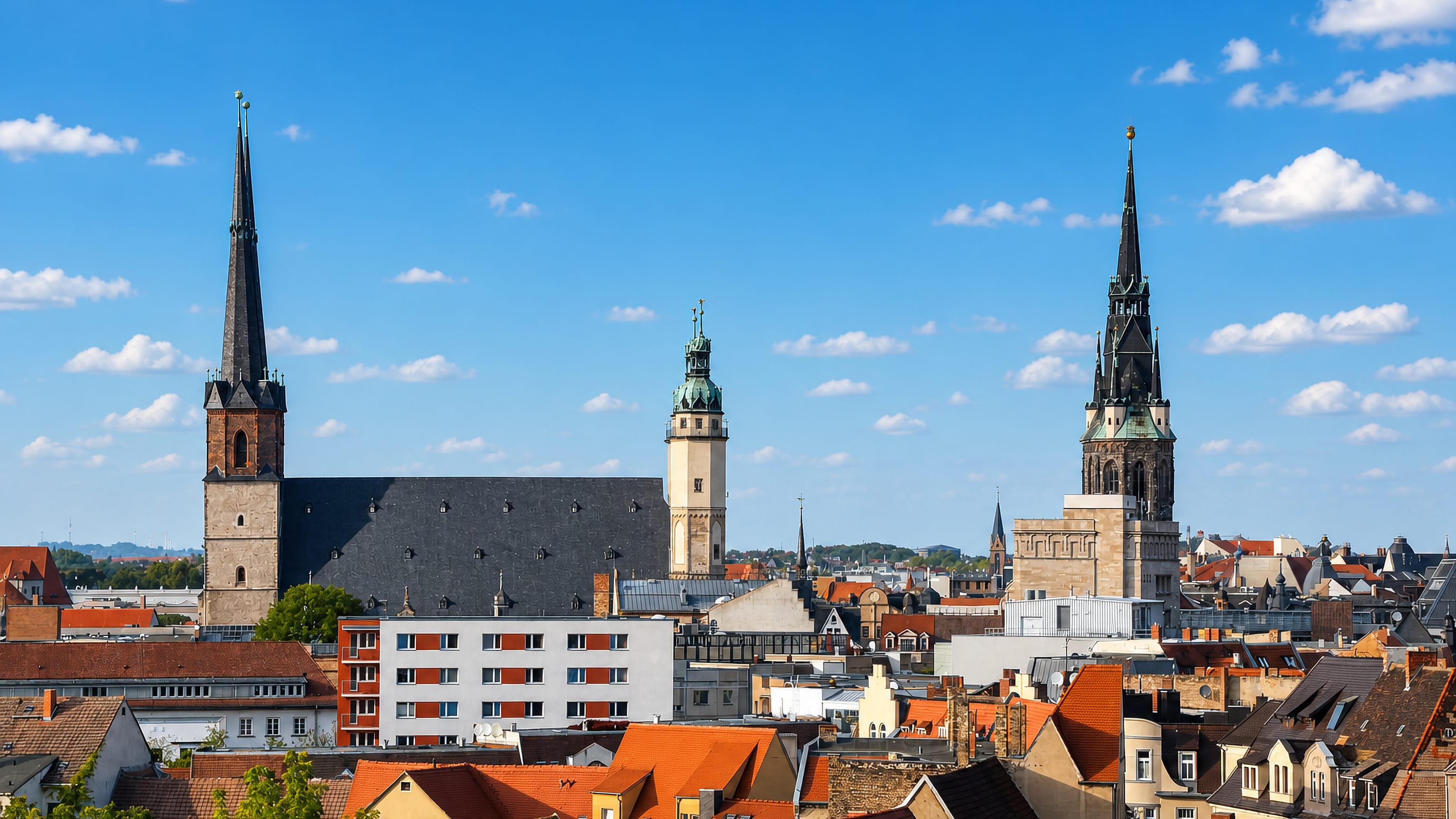 Halle (Saale) rooftops with the towers of the Marktkirche and the Roter Turm rising over the old town