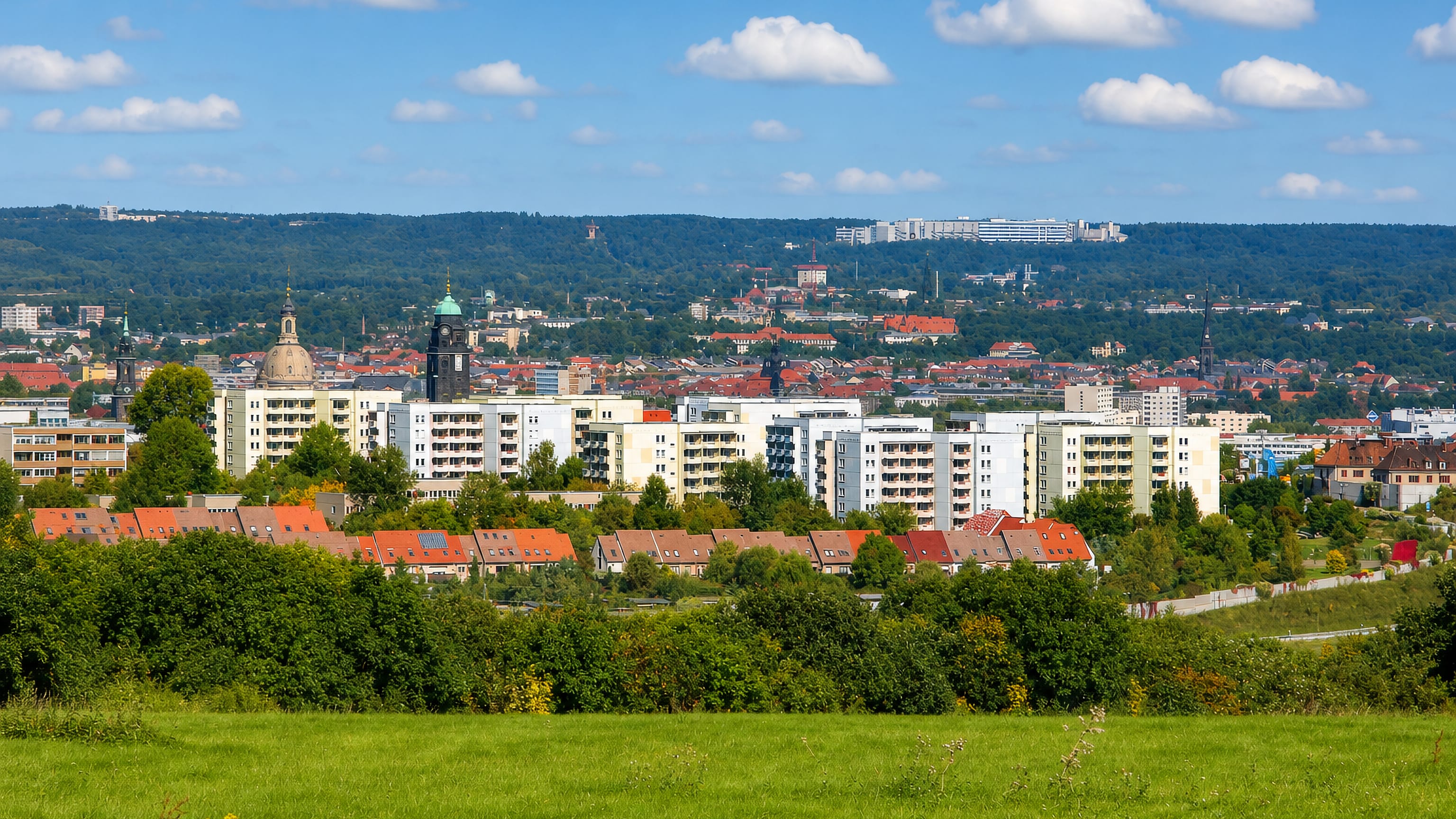 Apartment blocks of Albertstadt in Dresden with the Frauenkirche dome and Altstadt spires beyond