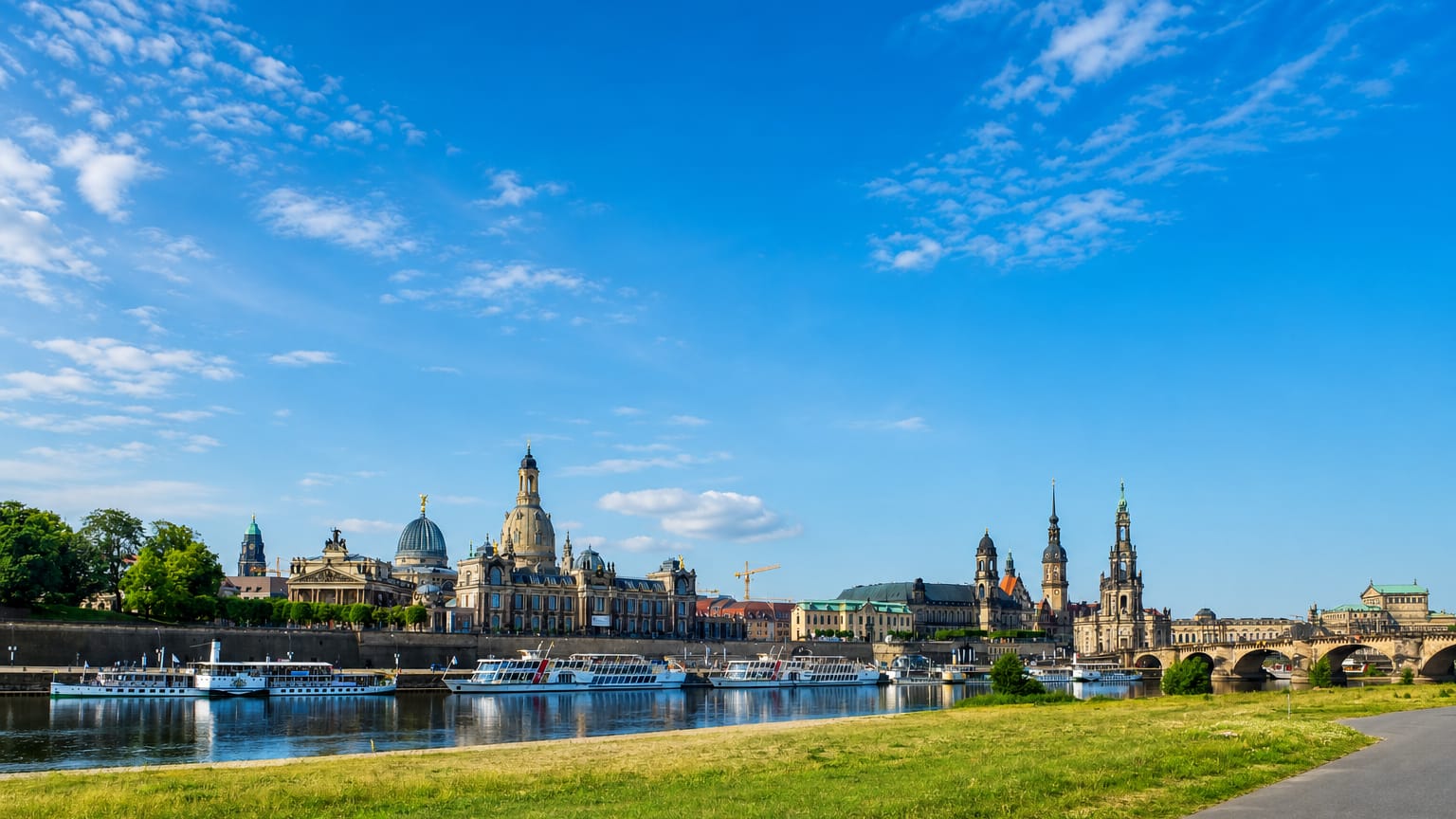 Dresden's old-town waterfront on the Elbe with the Frauenkirche dome, Hofkirche and Residenzschloss tower