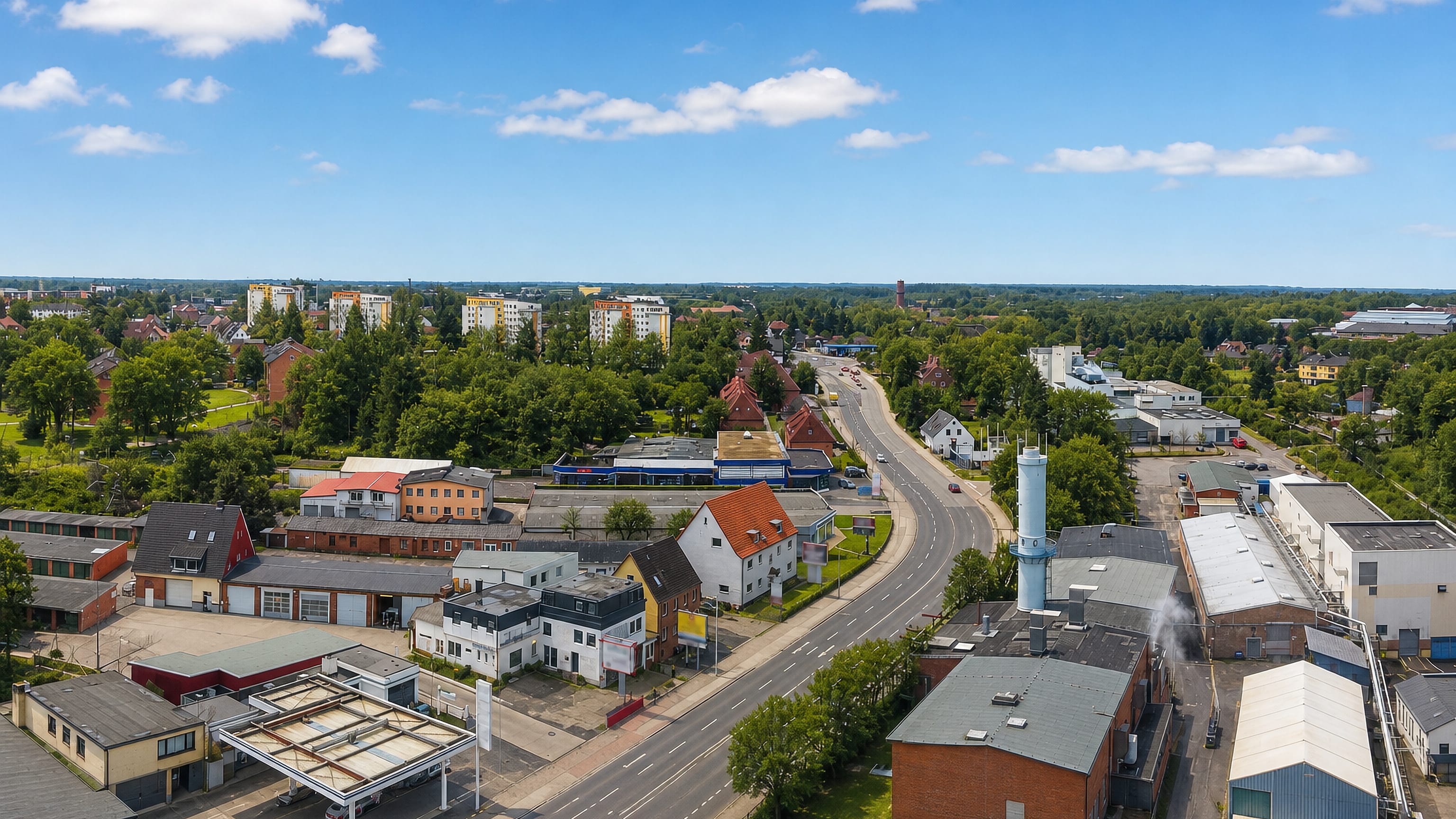 Aerial view over the main road, workshops and housing of Sudstadt on the southern edge of Flensburg.