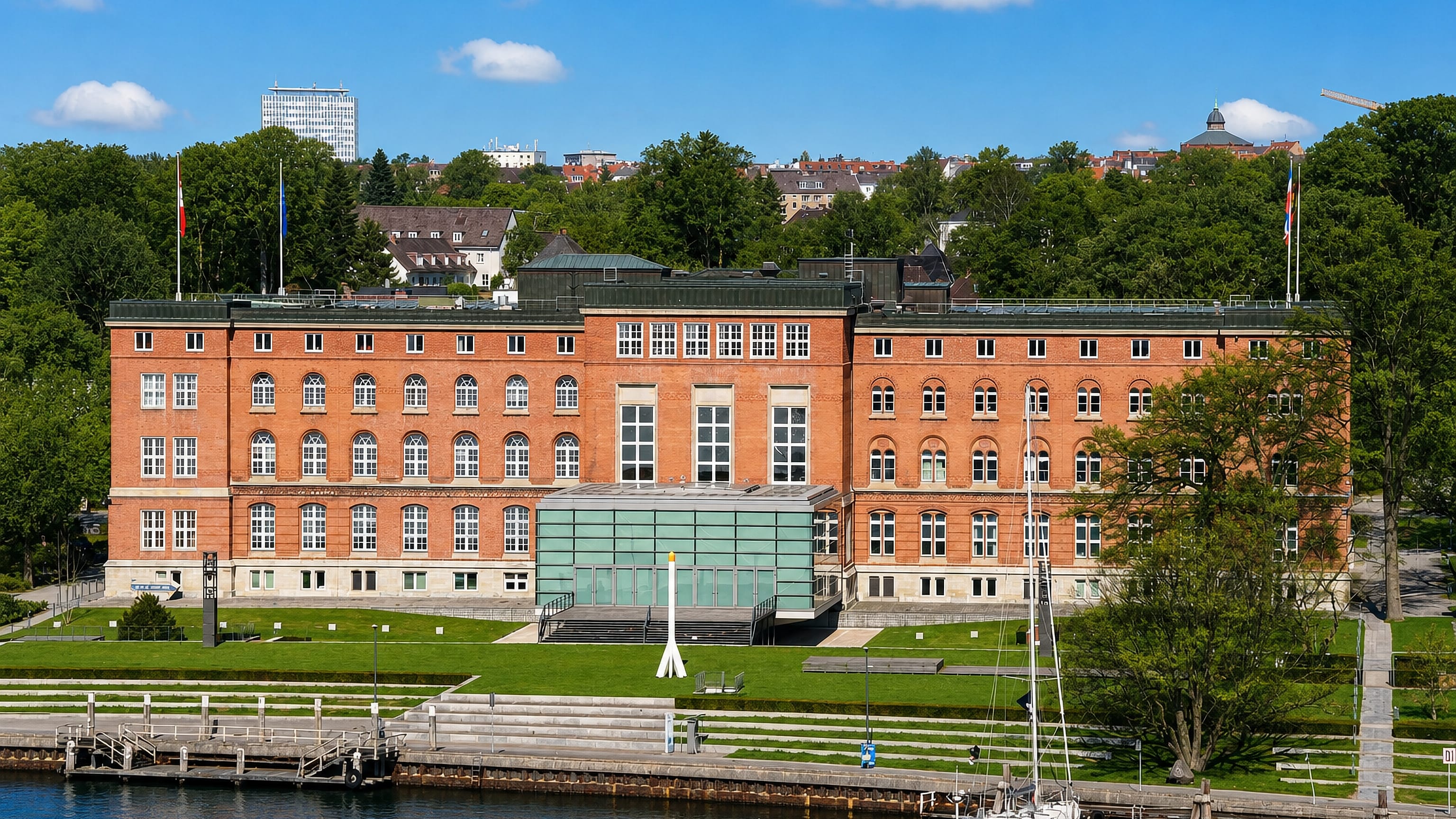 A red-brick waterfront parliament building on the Kiel Fjord at Düsternbrook, Kiel.