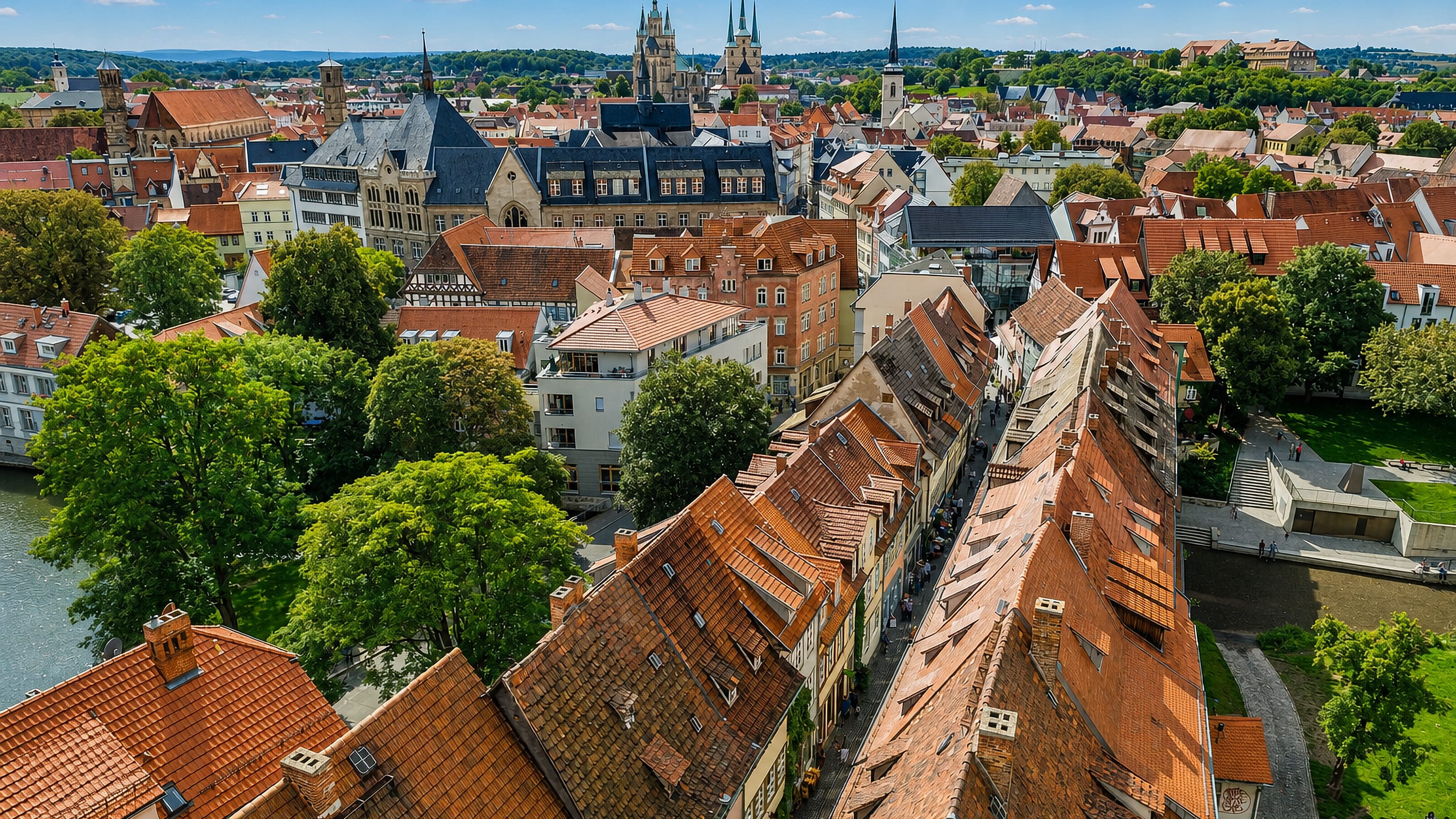 Aerial view over Erfurt's old town in Germany, the Krämerbrücke rooftops with the cathedral and Severikirche