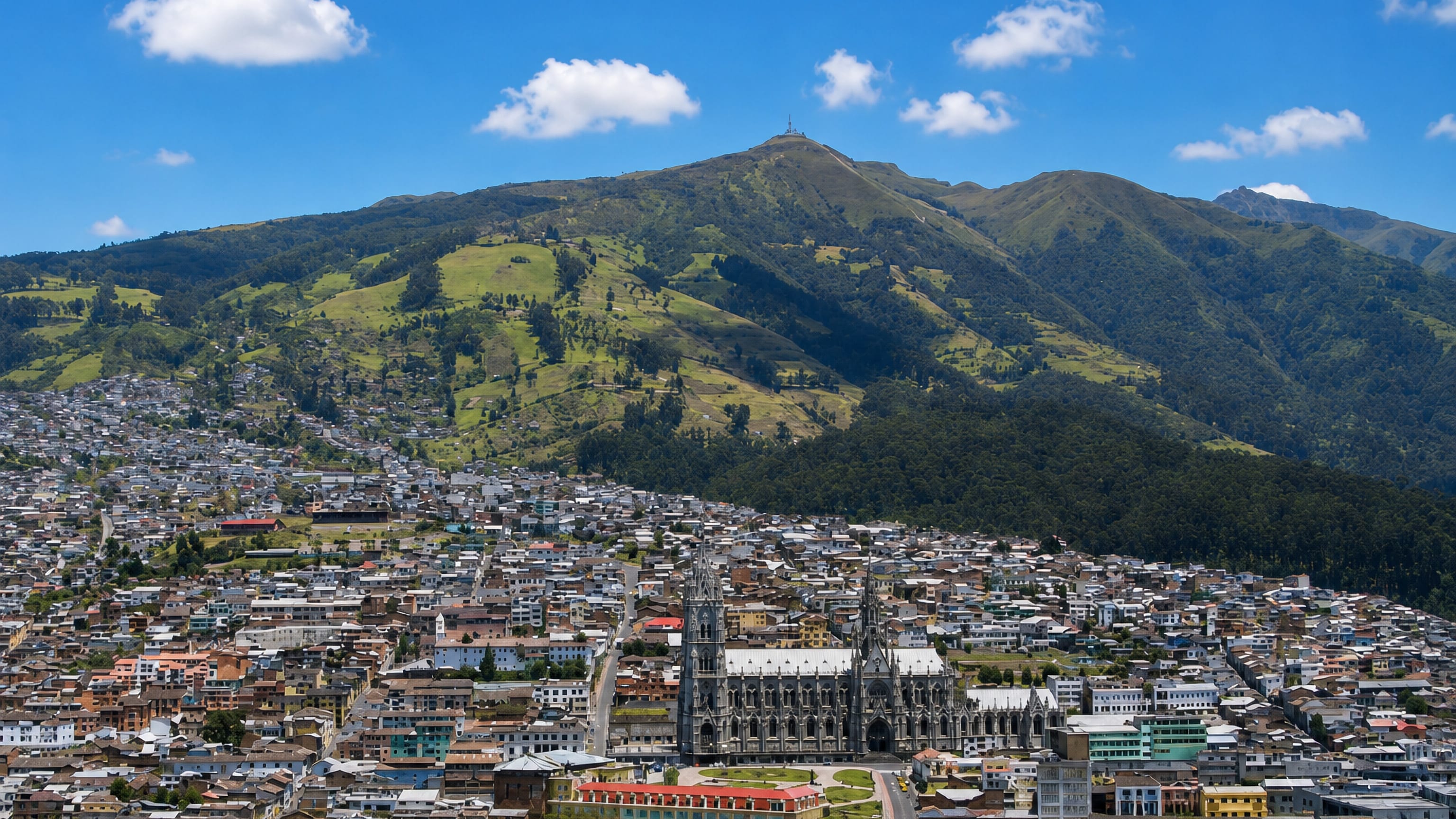 View from Itchimbia over Quito's old town to the Basilica del Voto Nacional and the Pichincha slopes.