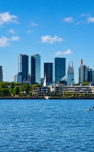 Tallinn's Kesklinn central business district skyline of glass towers seen across the water