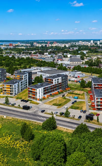 Aerial view of Mustamäe's modern residential apartment blocks and green spaces in Tallinn