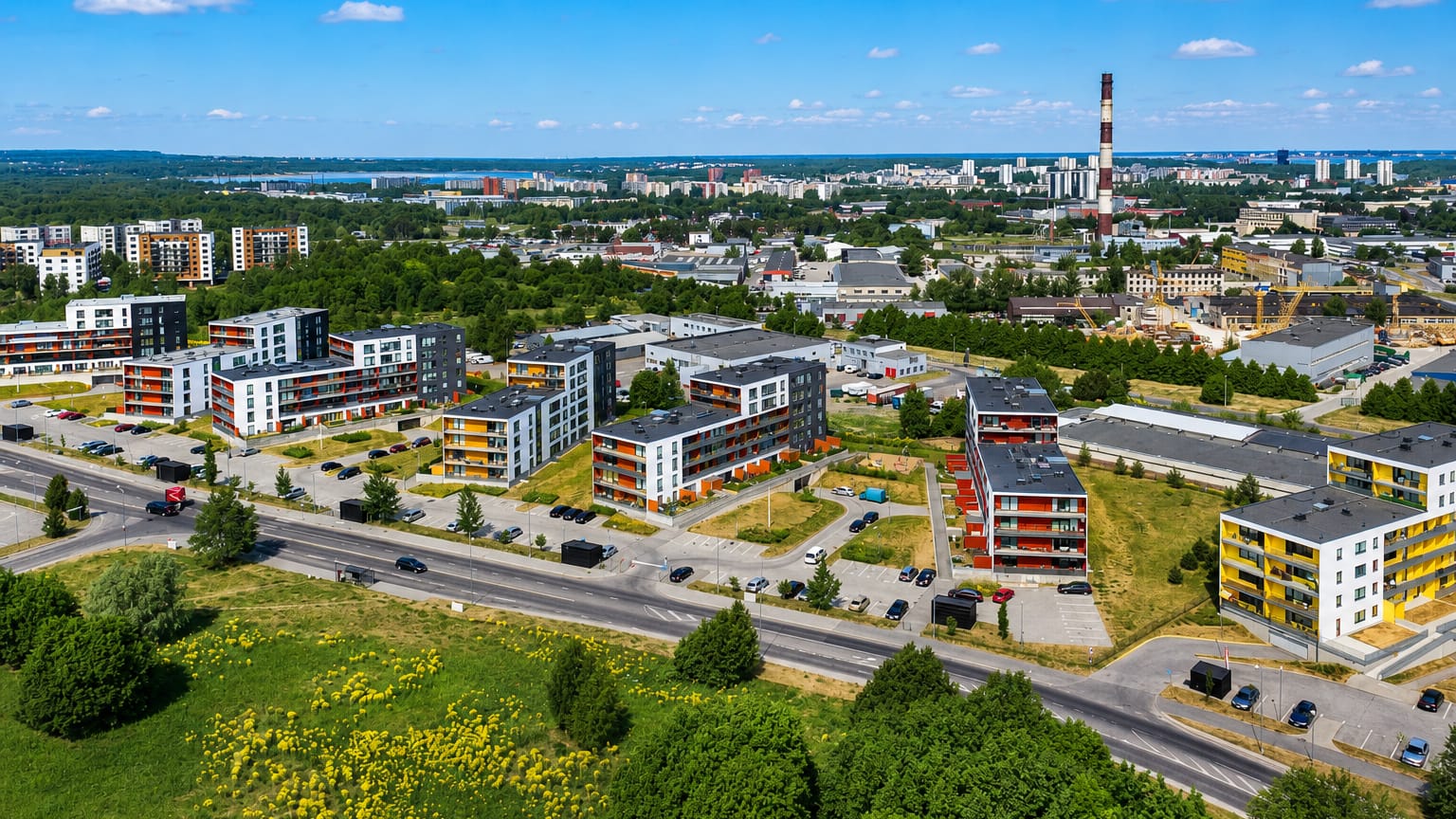 Aerial view of Mustamäe's modern residential apartment blocks and green spaces in Tallinn