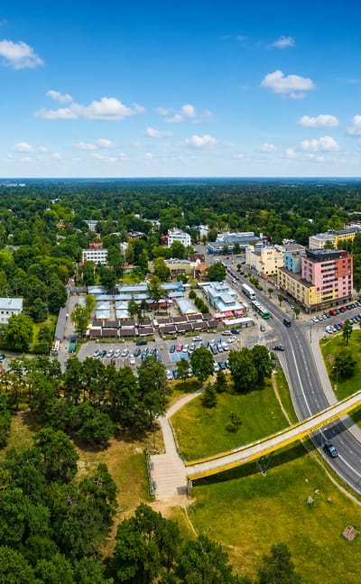 Aerial view of Nõmme's leafy residential district in Tallinn with a small town centre amid pine forest